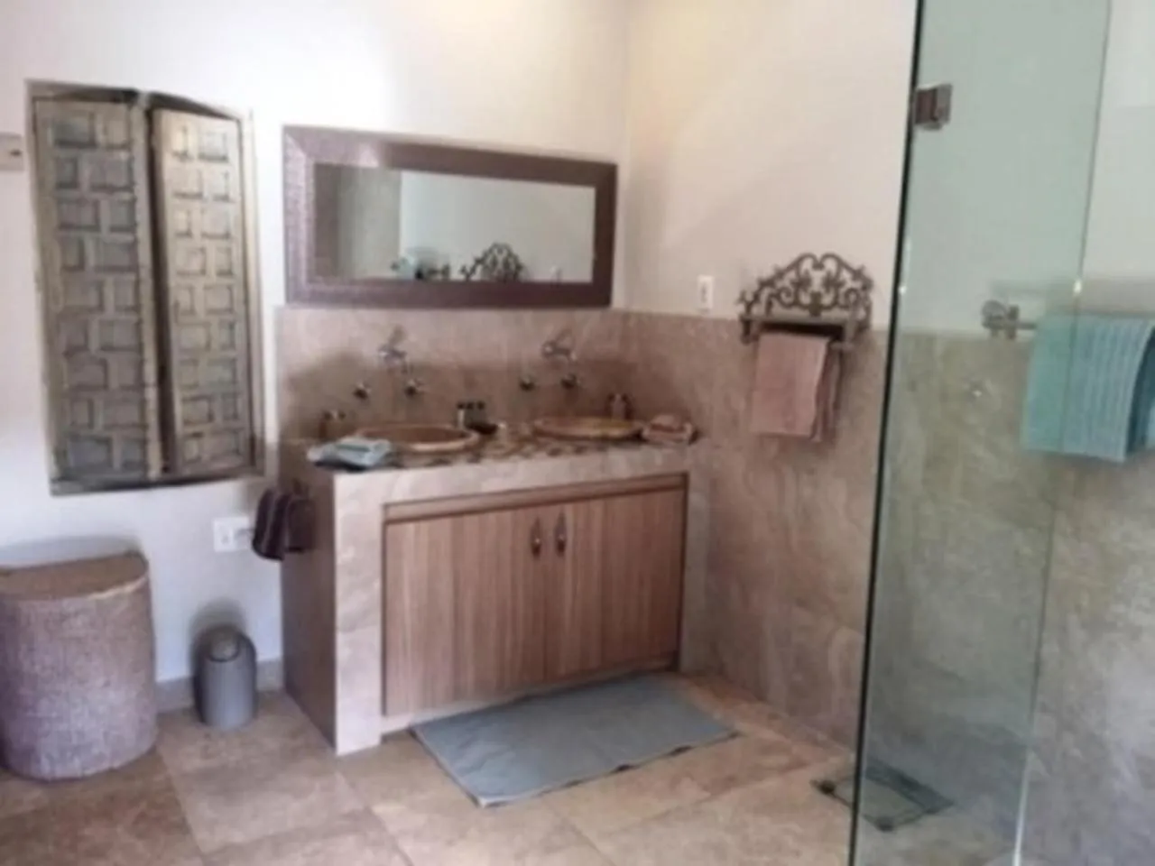 Bathroom in African Palm Cottage and Guesthouse