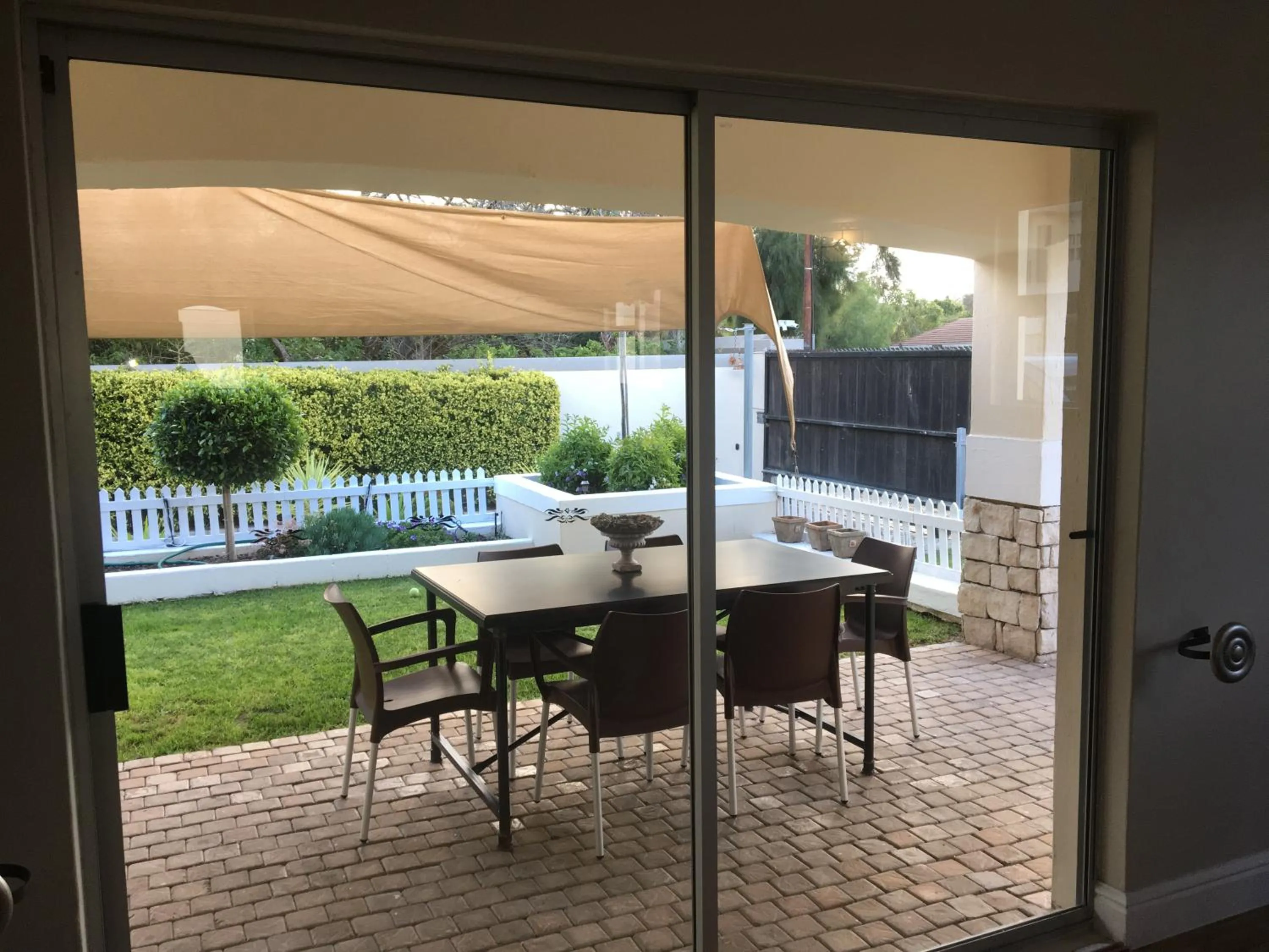 Patio in African Palm Cottage and Guesthouse
