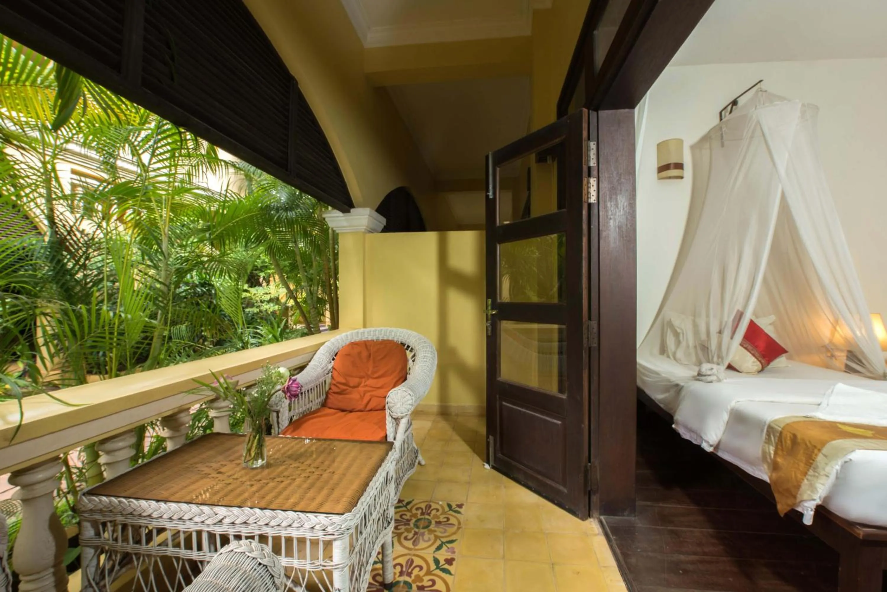 Balcony/Terrace, Bed in Marirath Boutique Hotel