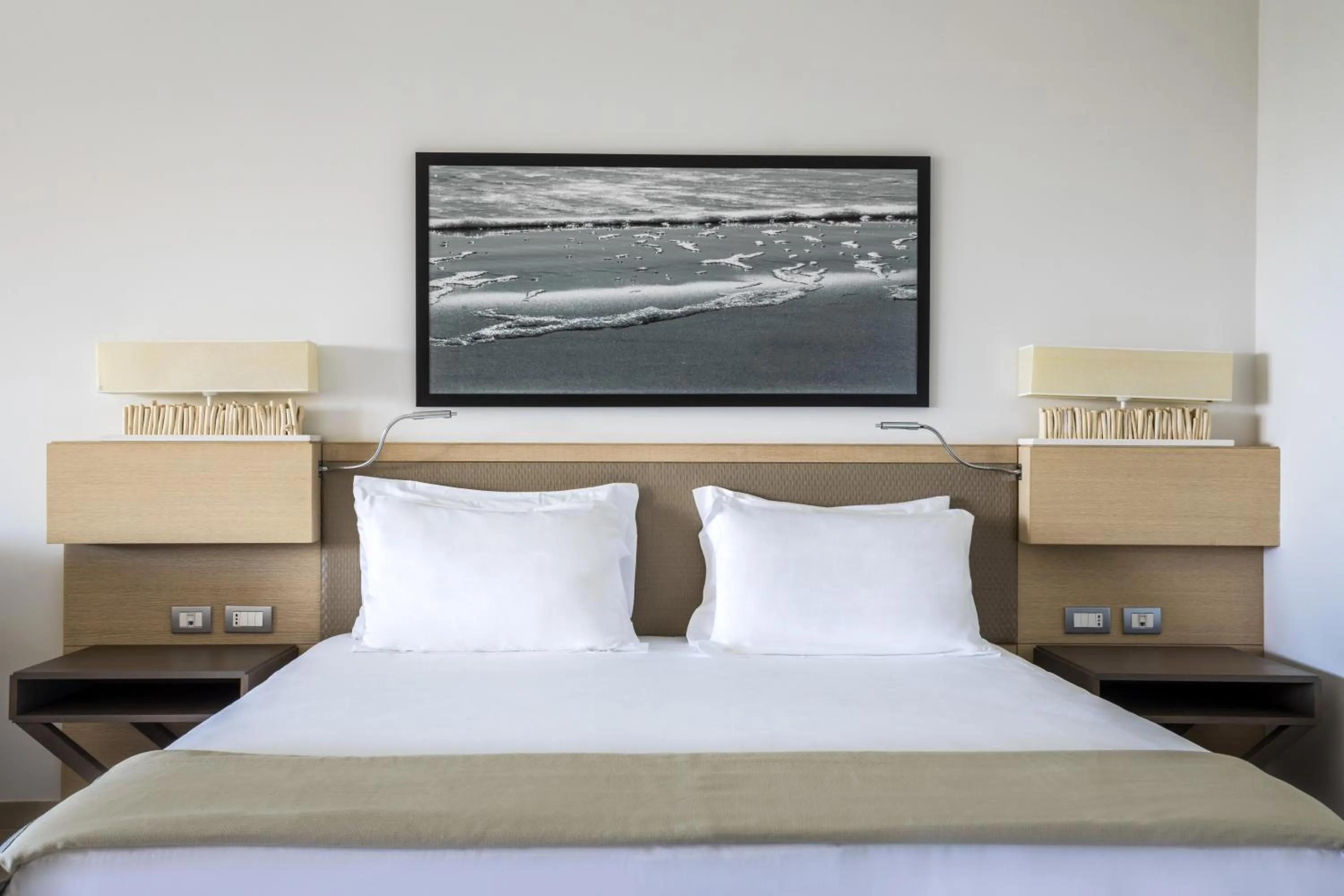 Bed in Capovaticano Resort Thalasso Spa