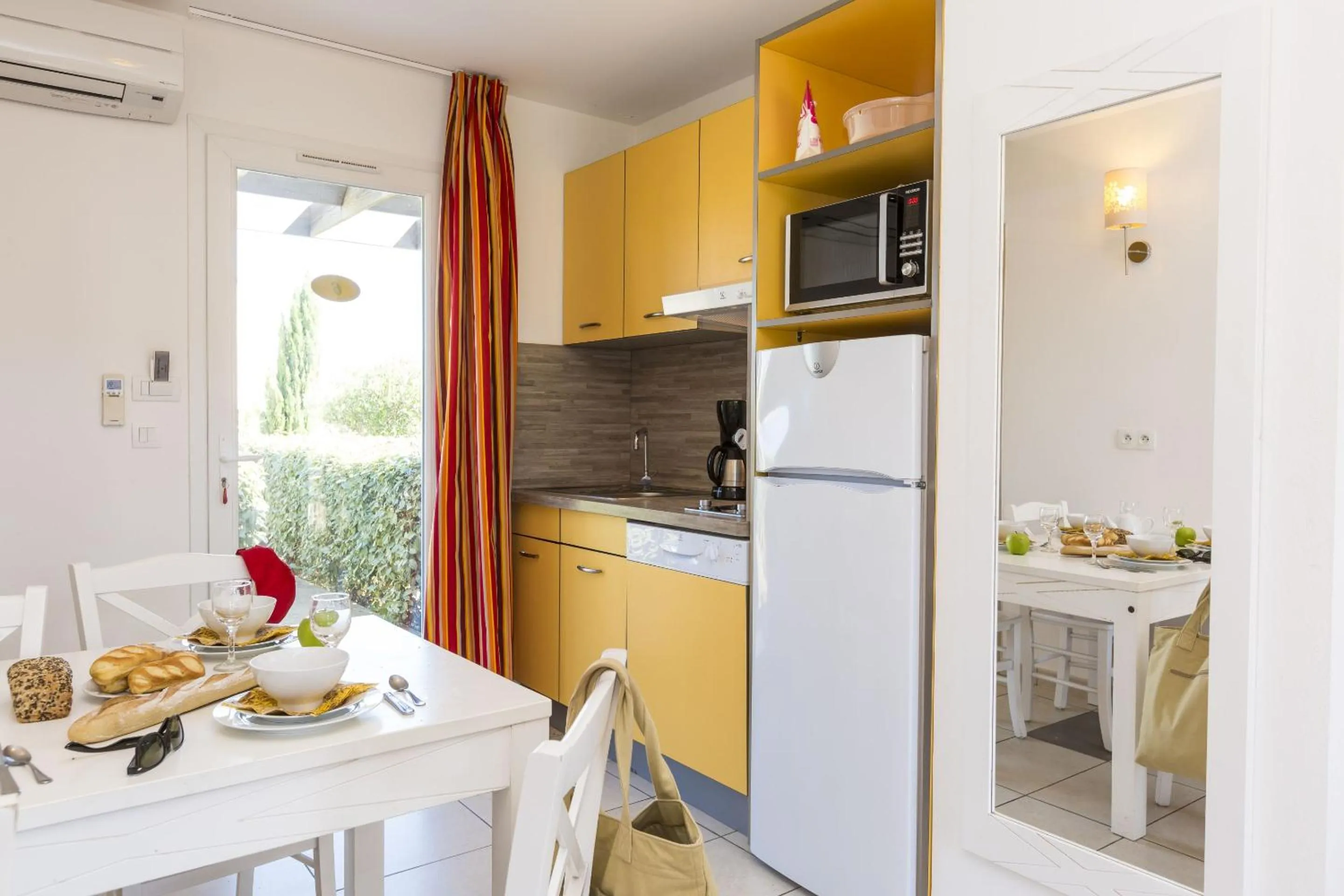 Kitchen or kitchenette in Résidence Odalys Les Villas de Bel Godère