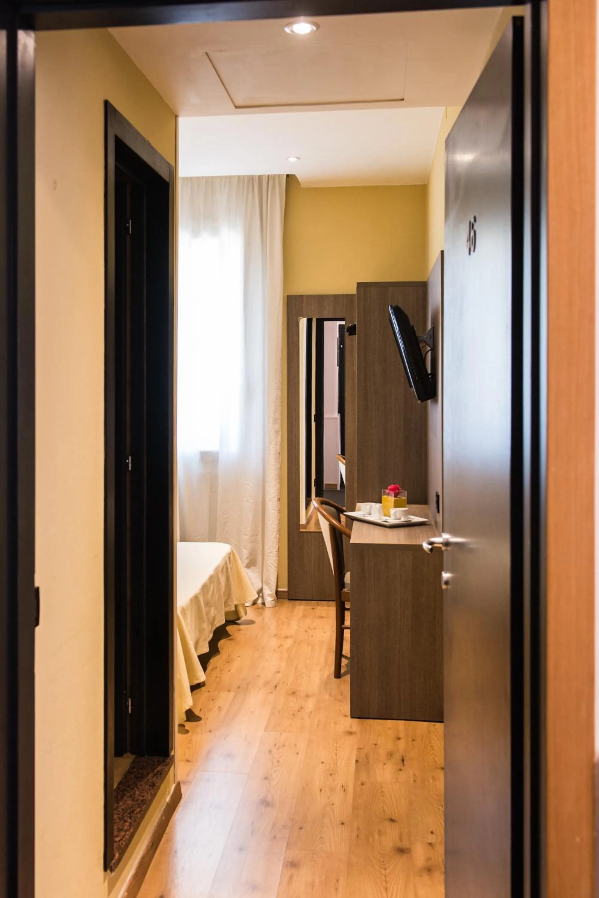 Decorative detail, Bed in Albergo Grappolo D'oro