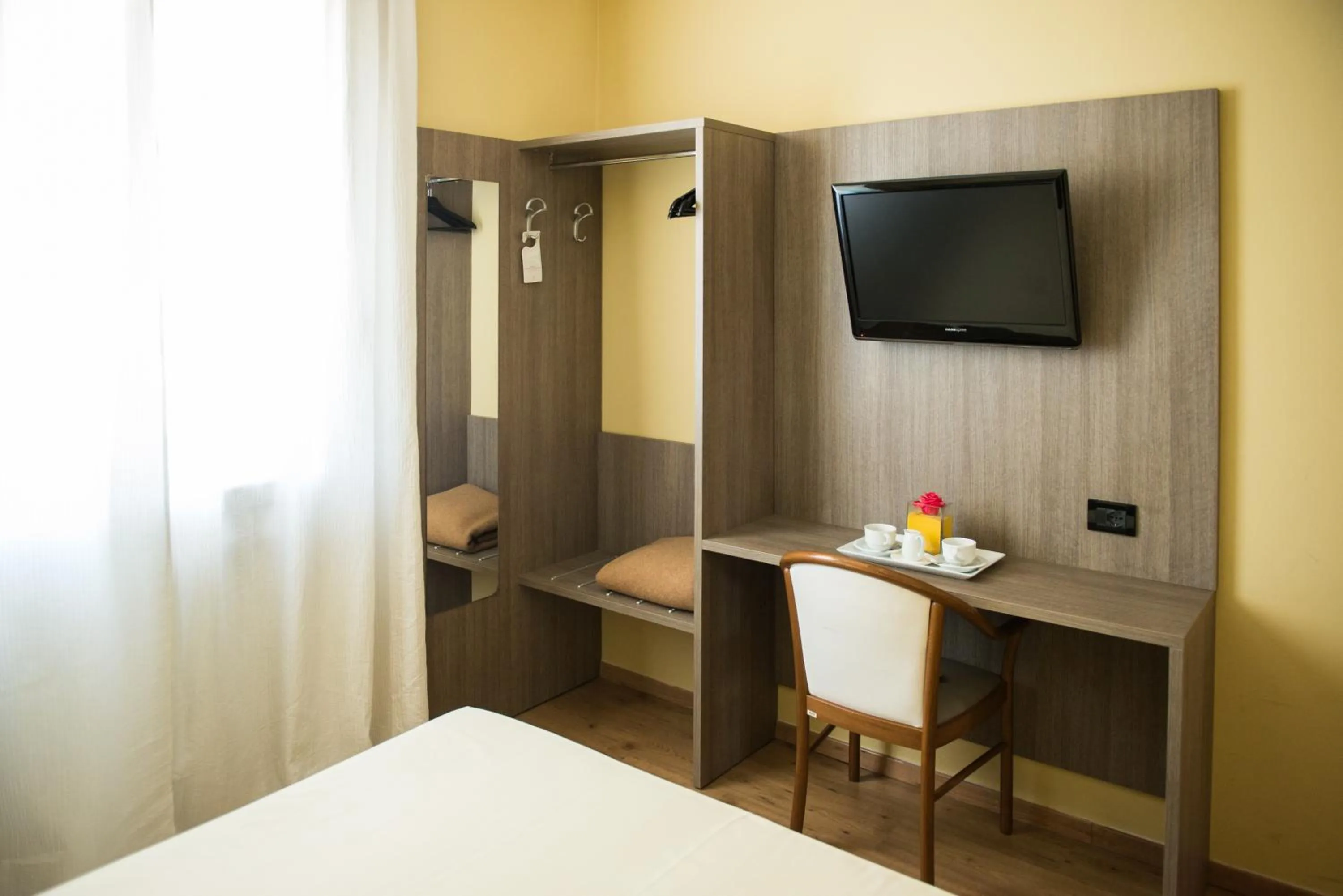 Decorative detail, Bed in Albergo Grappolo D'oro