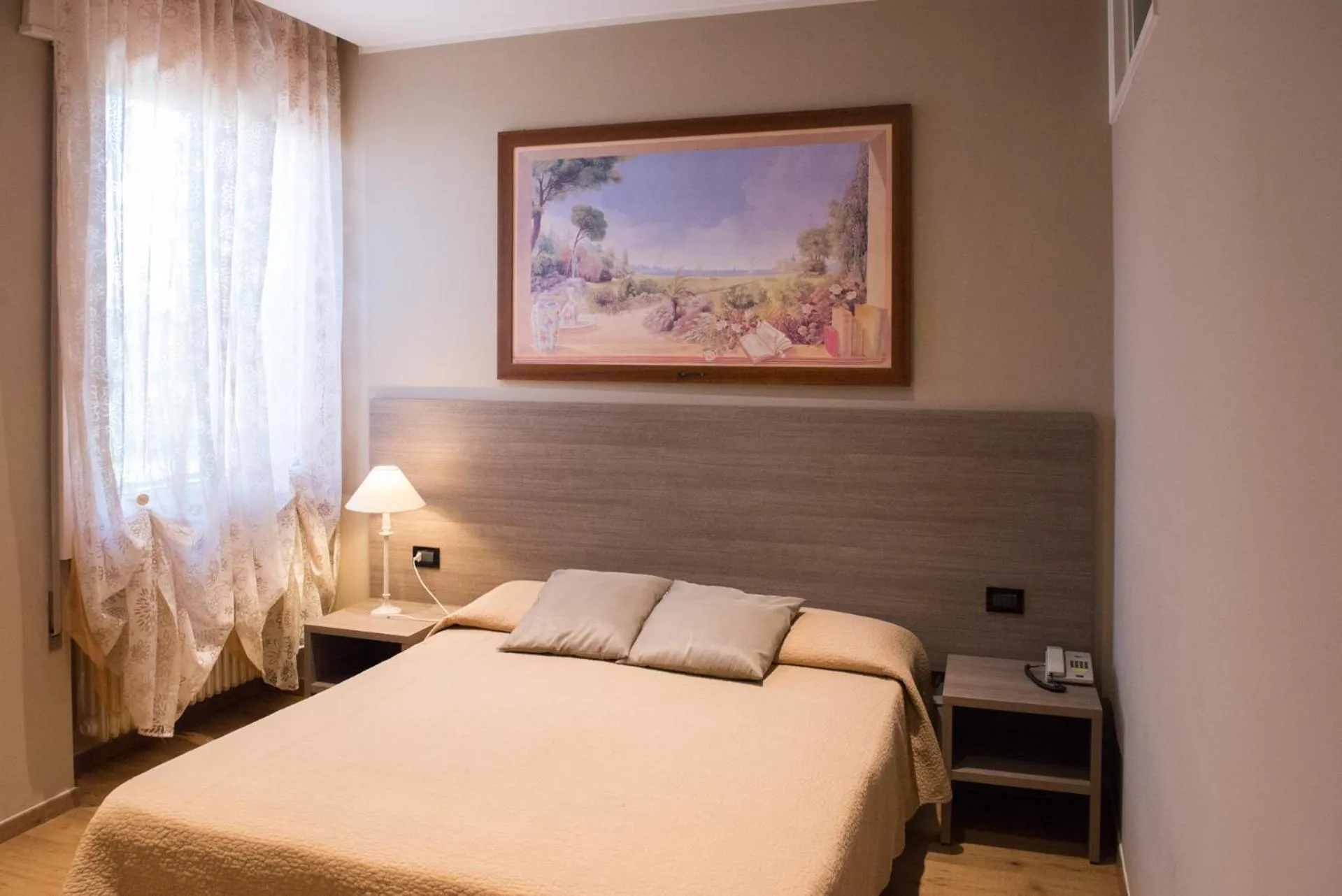 Bed in Albergo Grappolo D'oro
