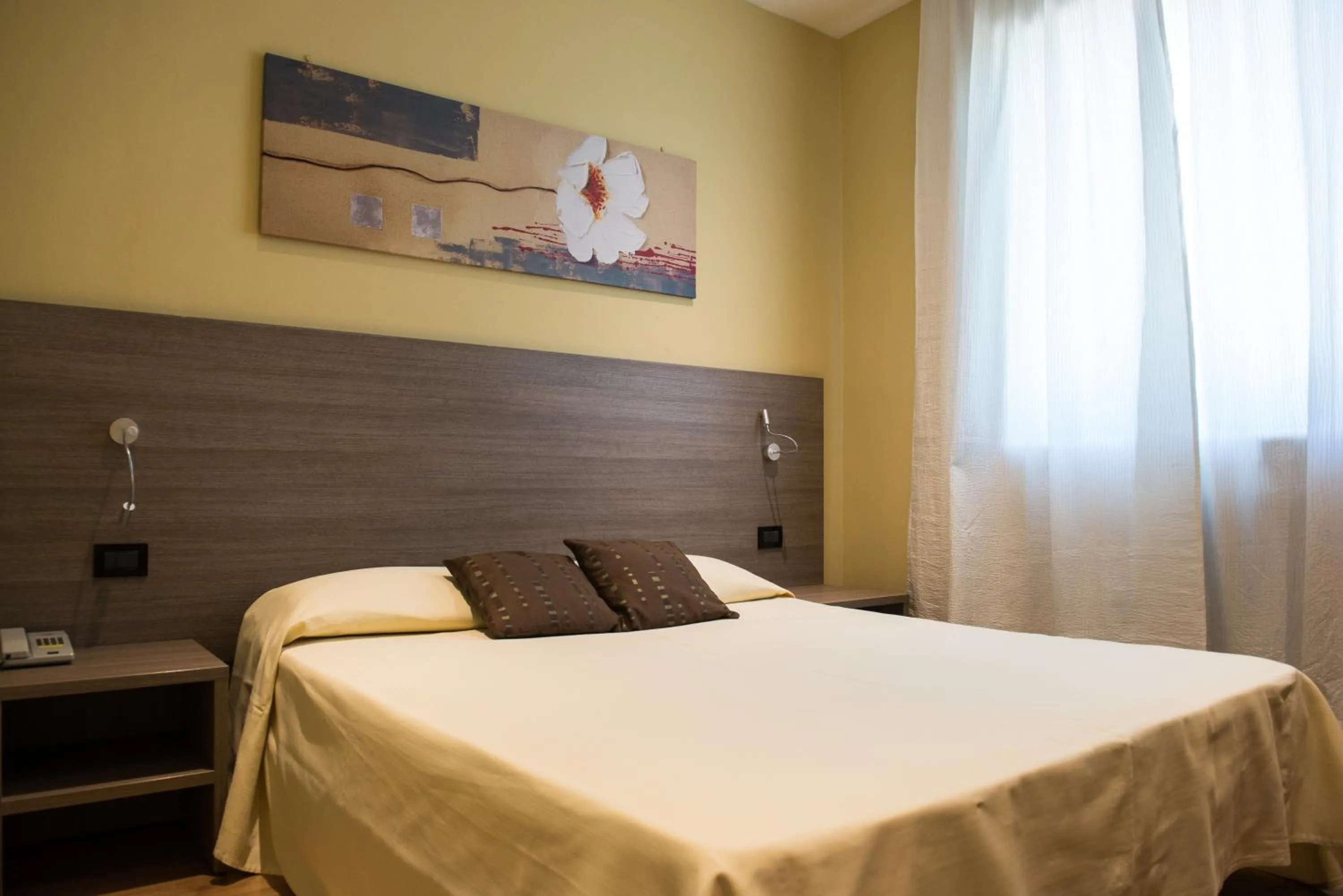 Bed in Albergo Grappolo D'oro