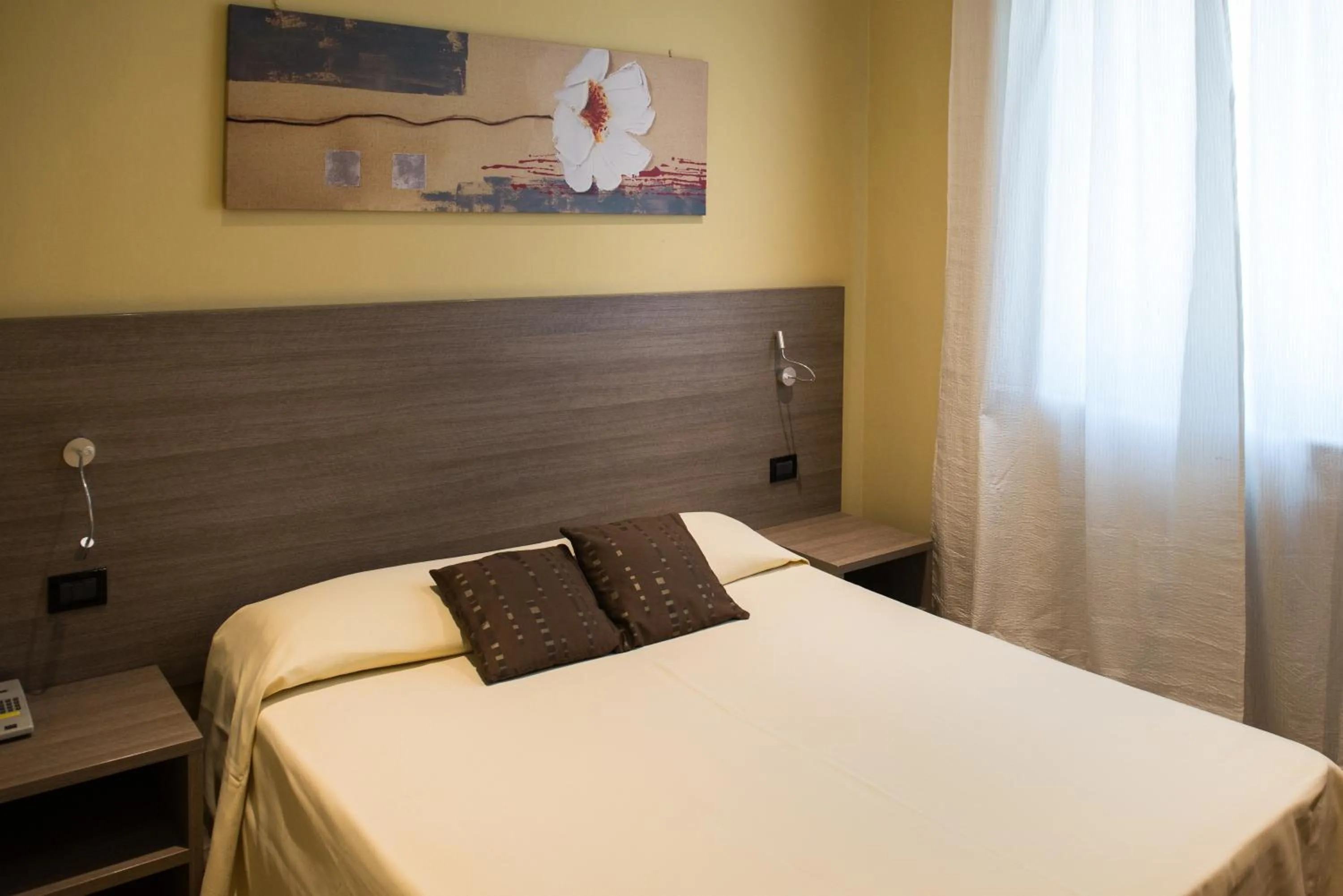 Bed in Albergo Grappolo D'oro