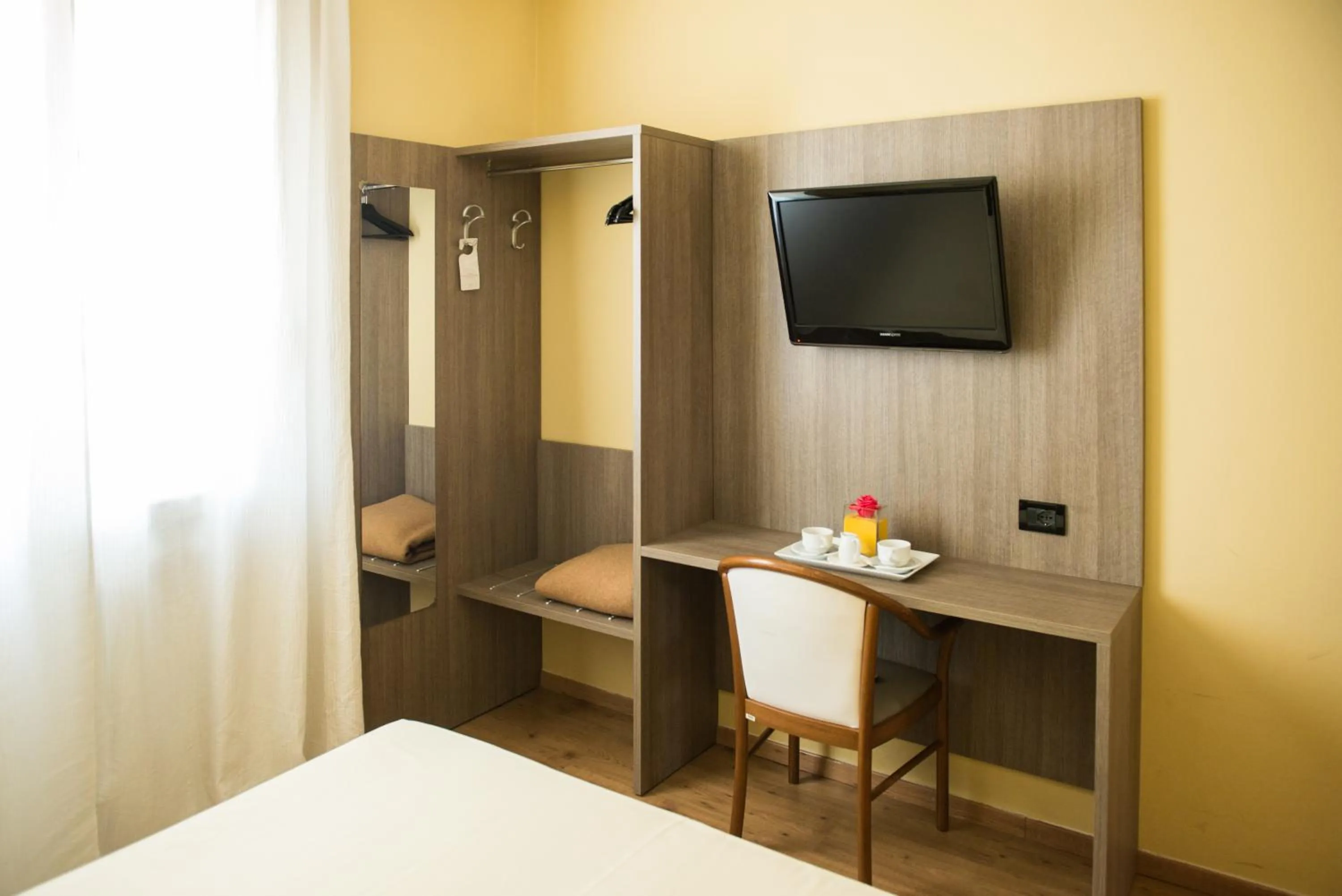 Decorative detail, Bed in Albergo Grappolo D'oro