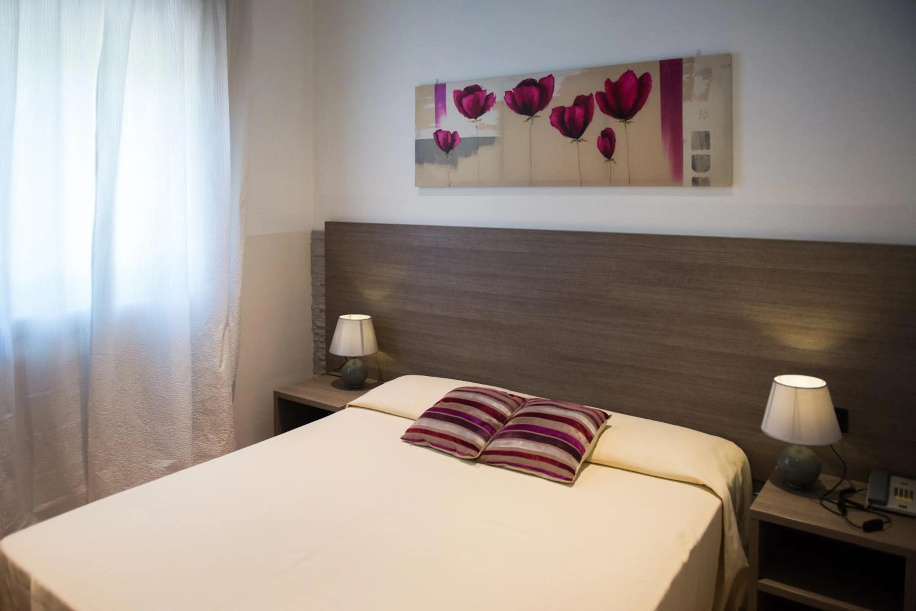 Bed in Albergo Grappolo D'oro