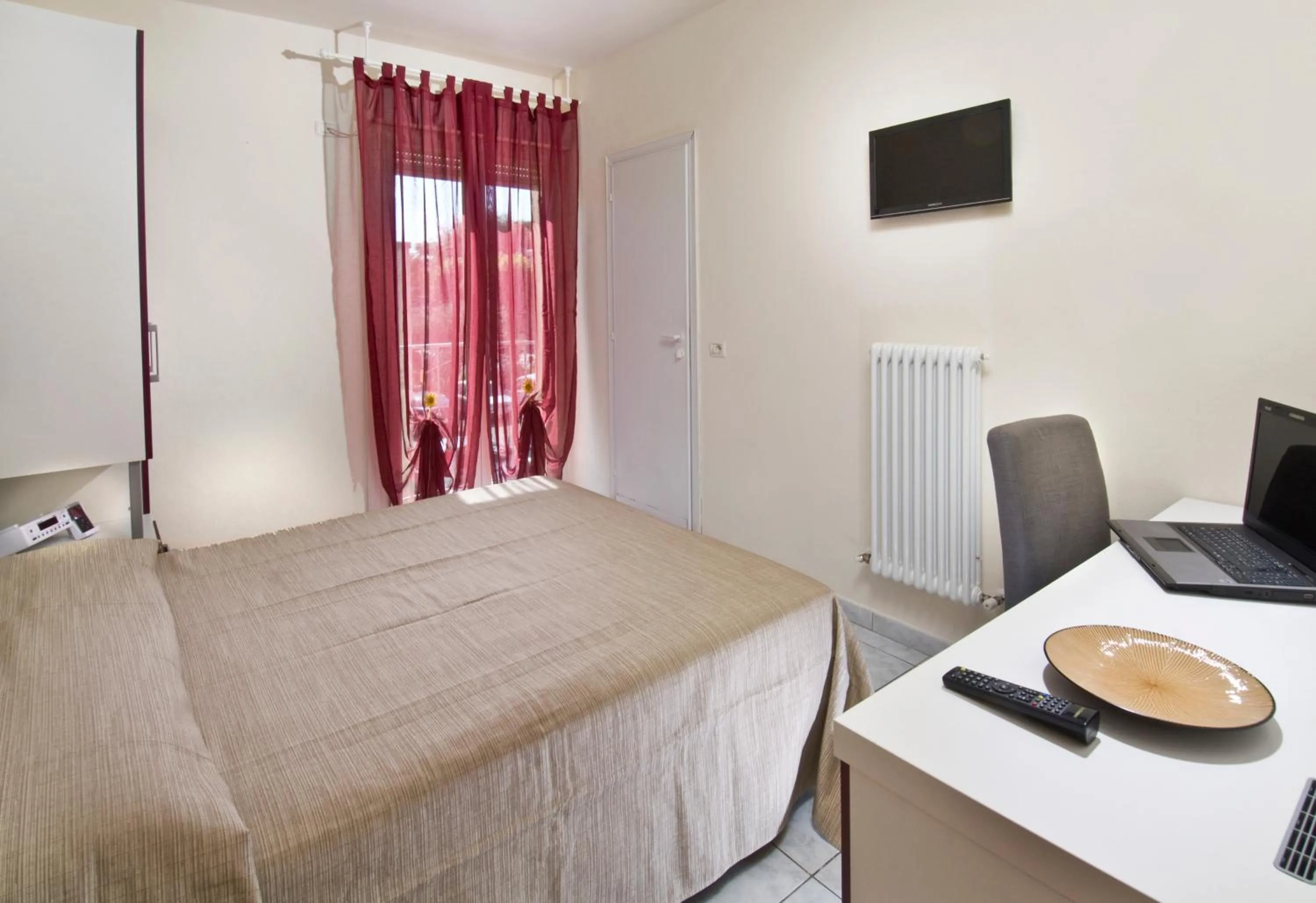 Bed in Hotel Locanda Rosy