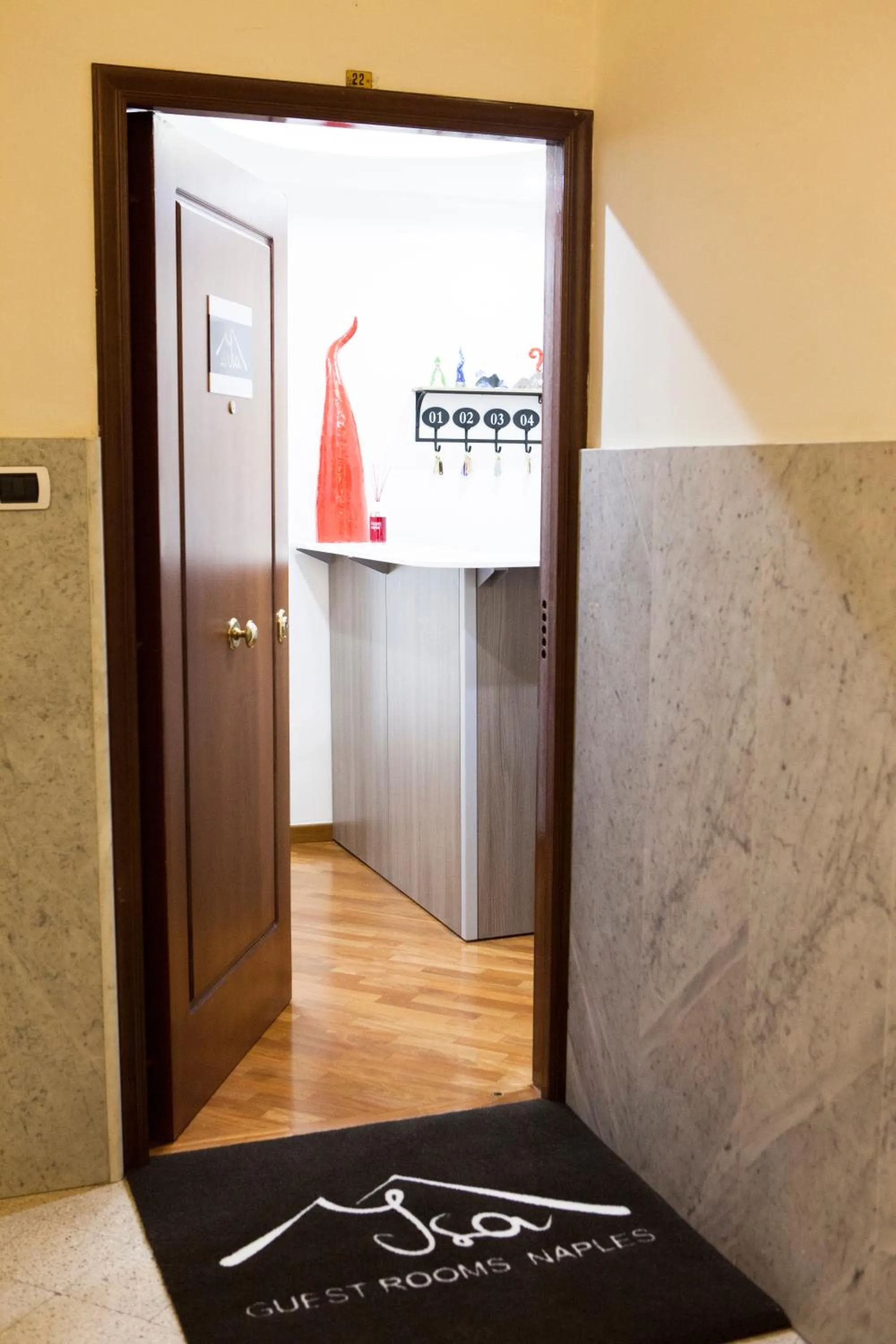 Facade/entrance in Isa Guest Rooms