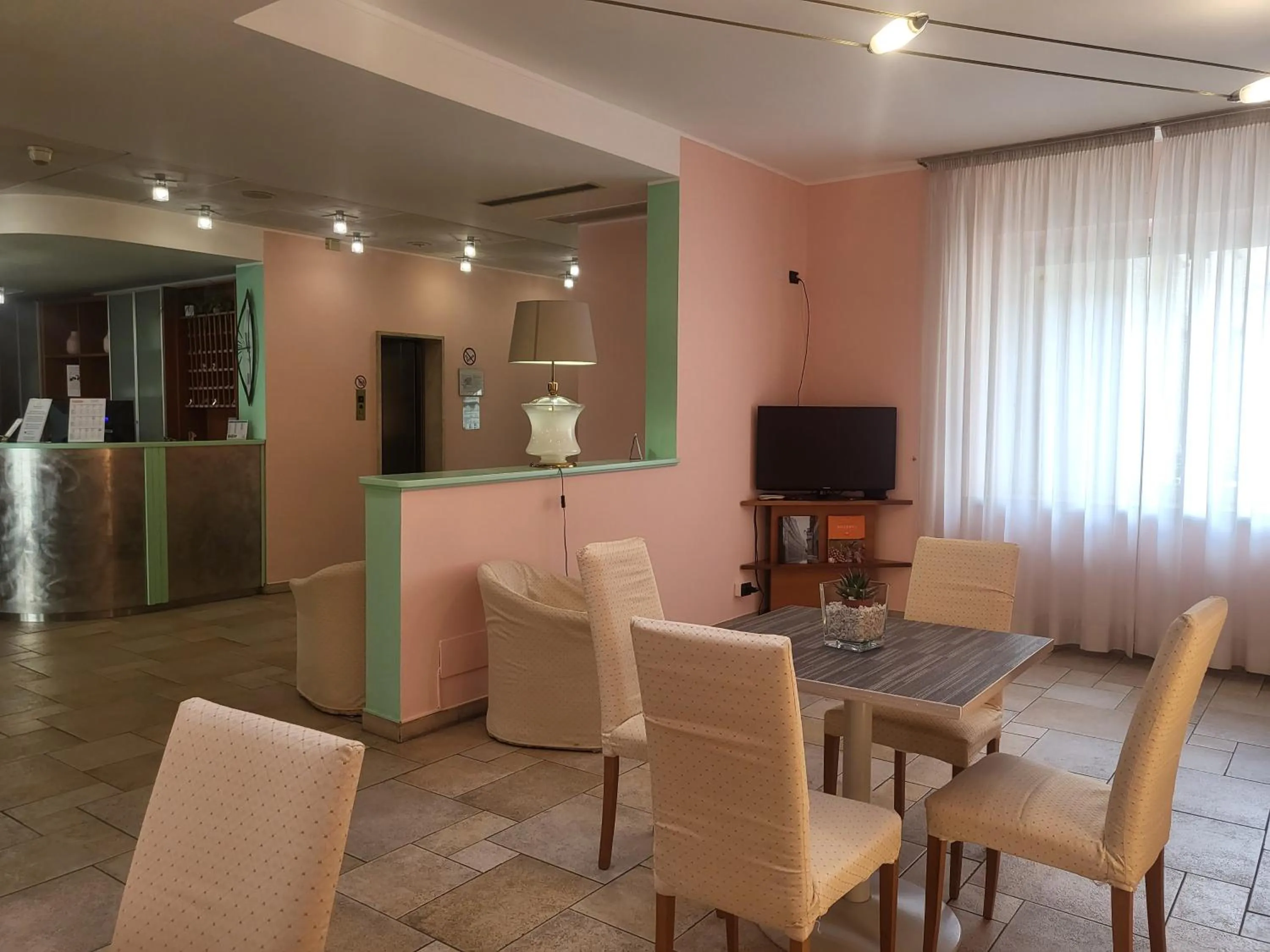 Communal lounge/ TV room in Hotel Lux