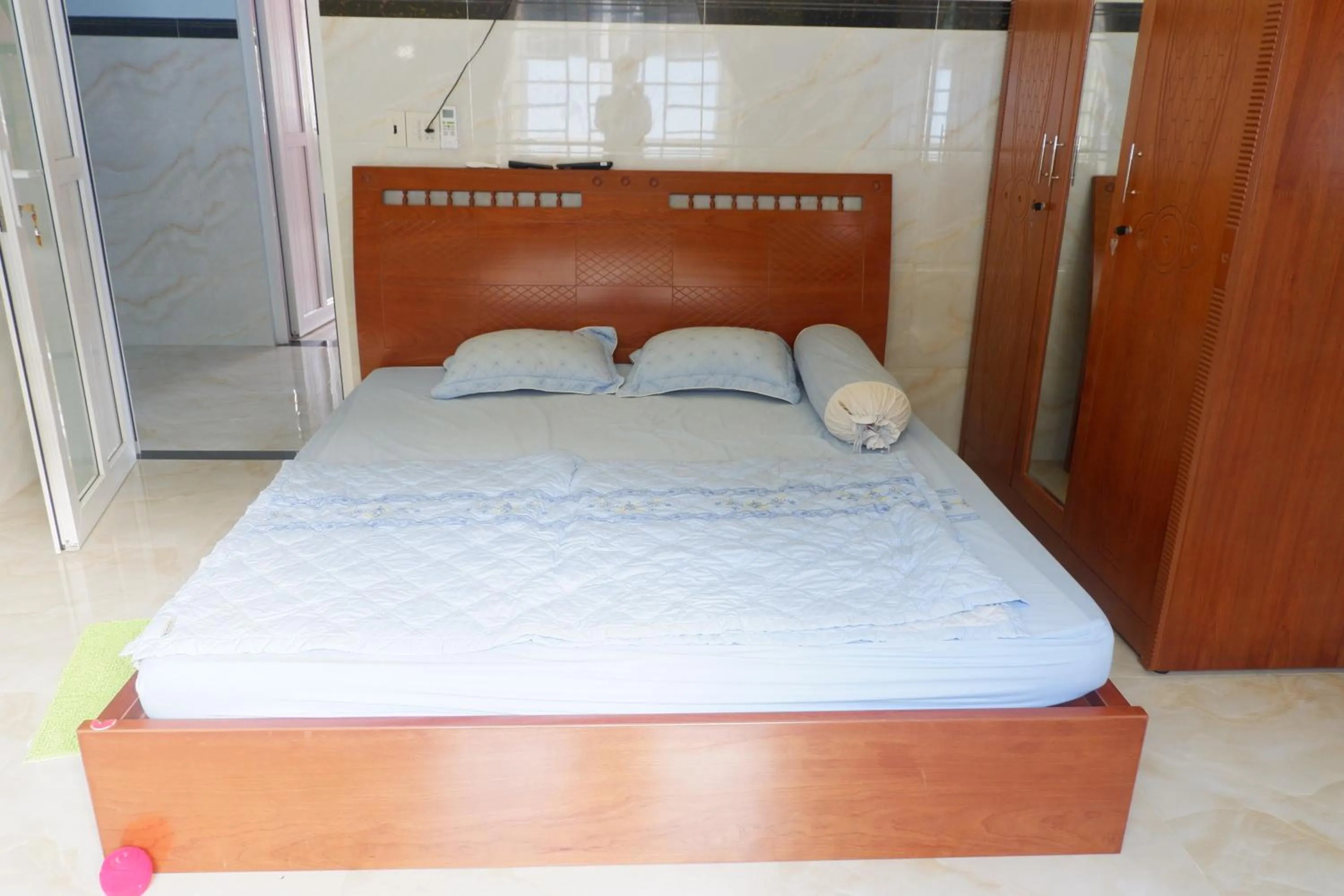 Bed in Hanh Mai Hotel