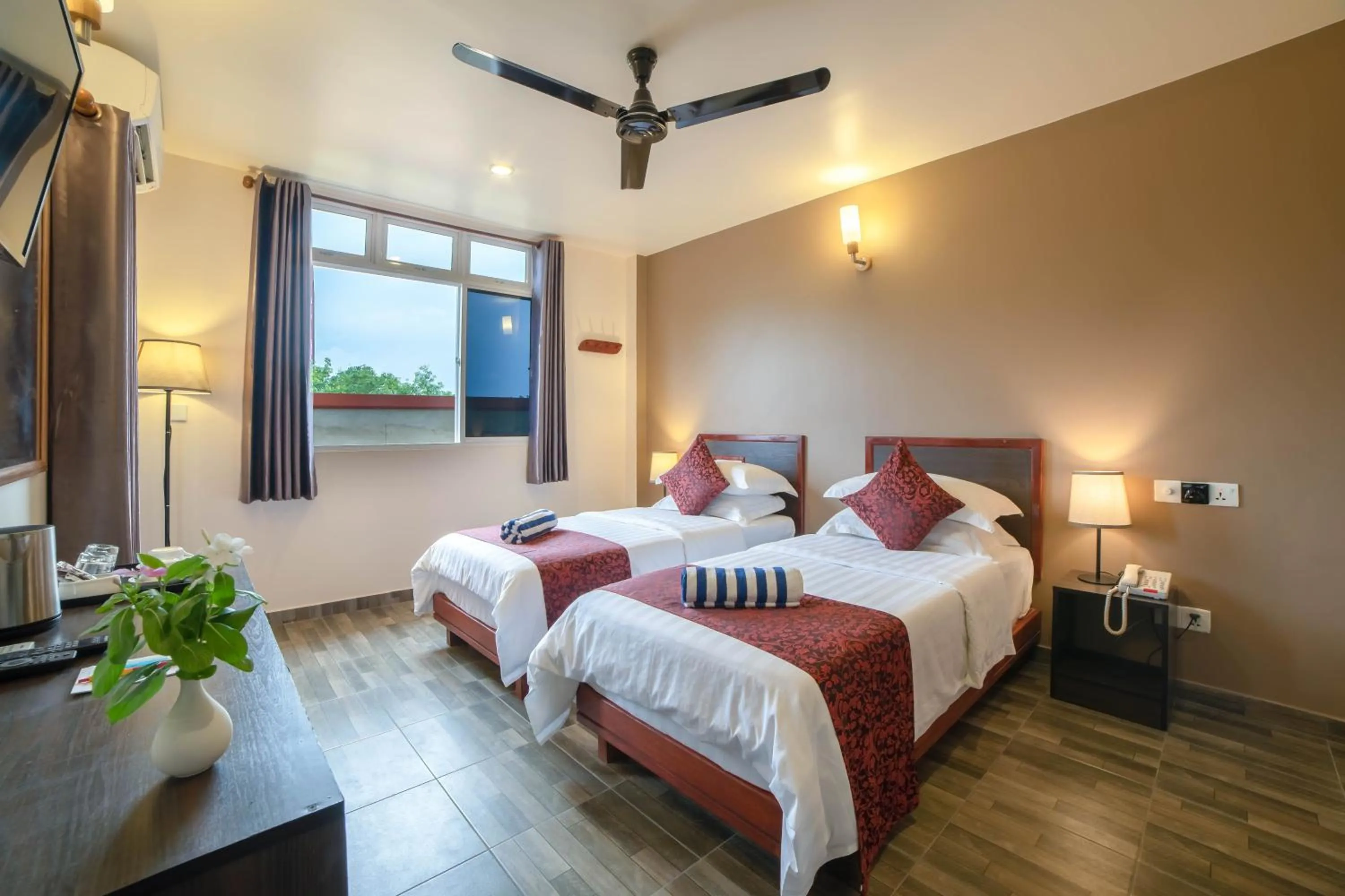 Bed in Paguro Beach Inn