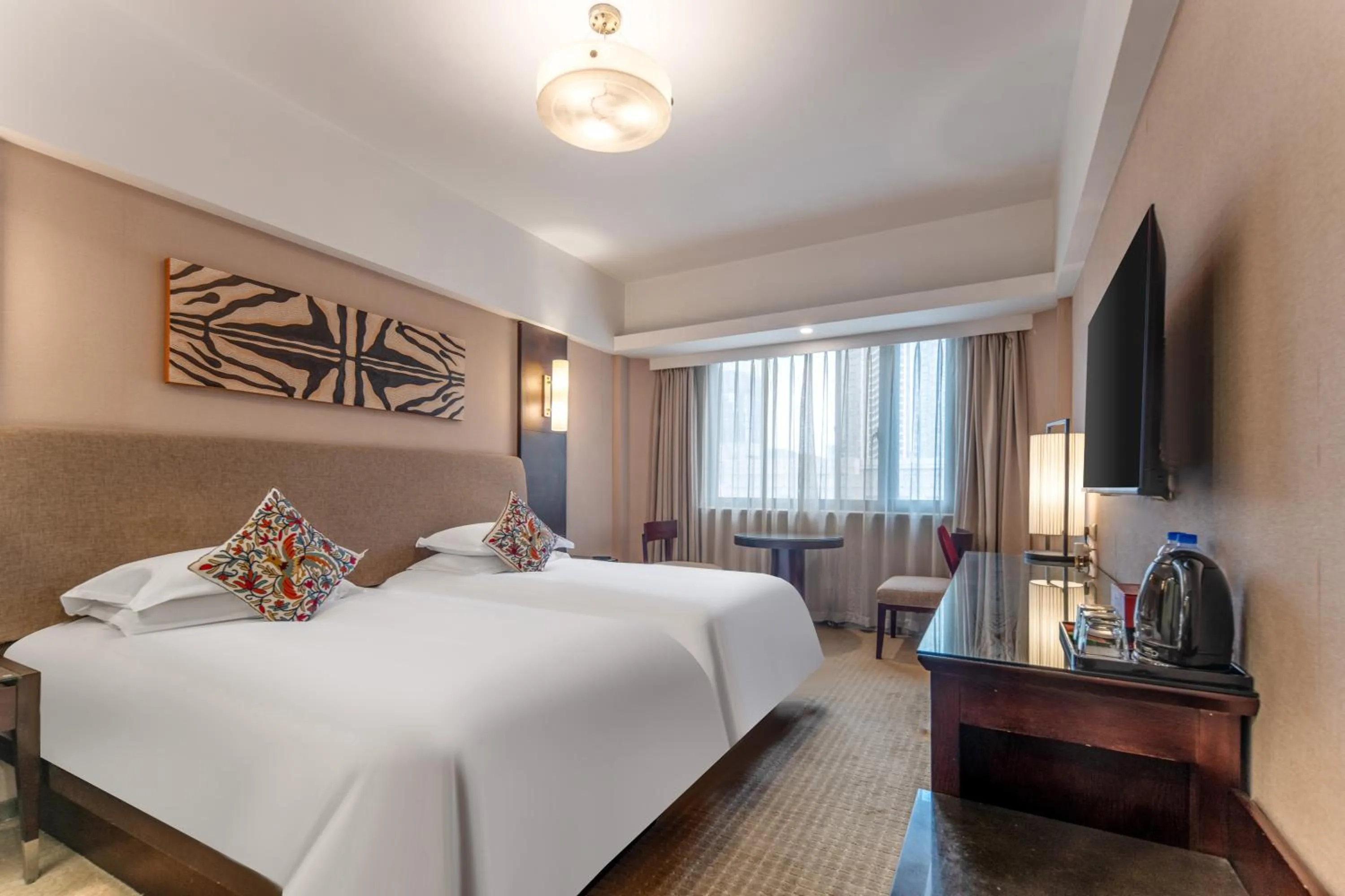 Bed in SSAW Boutique Hotel Hangzhou West Lake Yilian