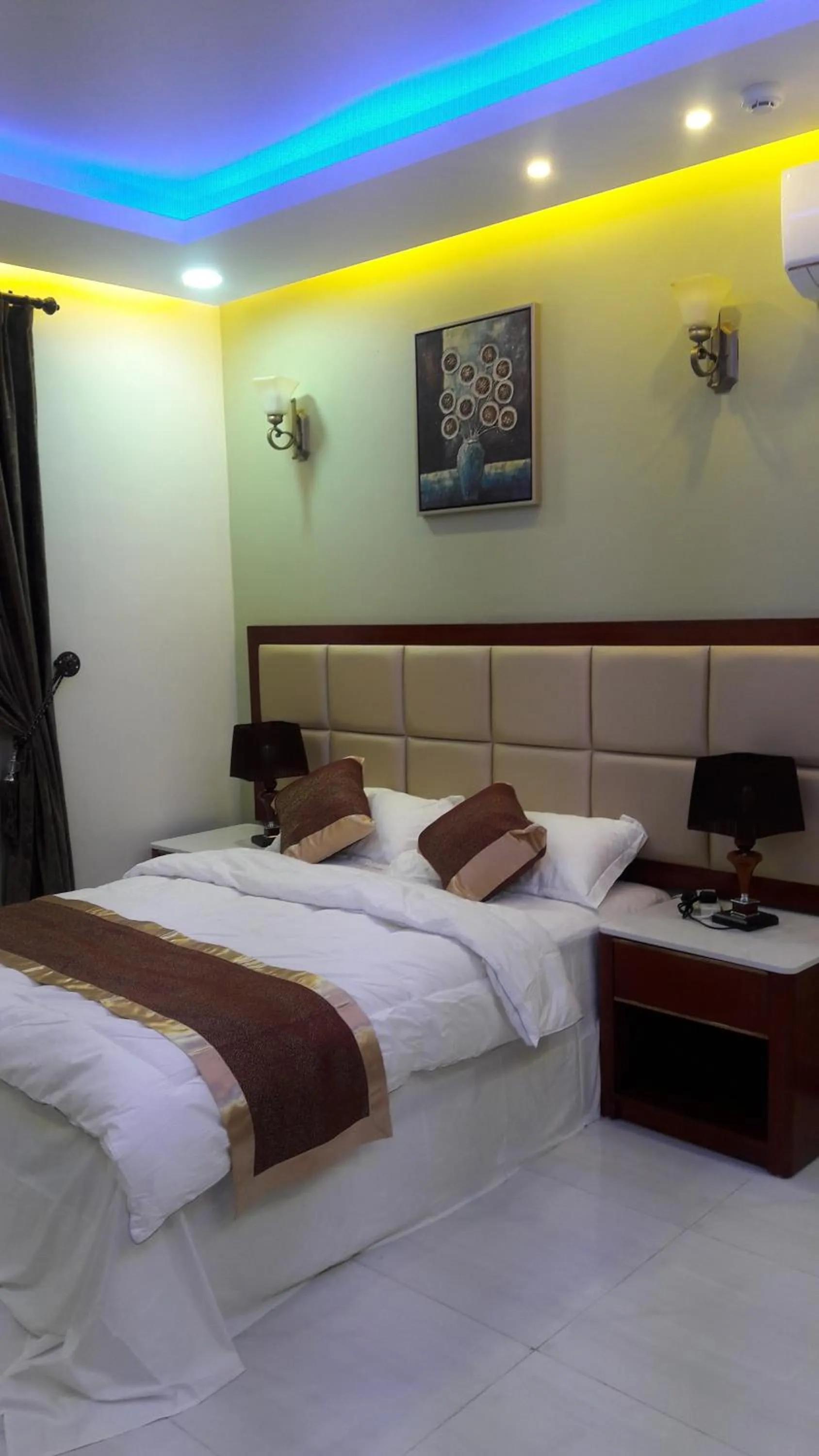 Bed in Ashbilia Suites