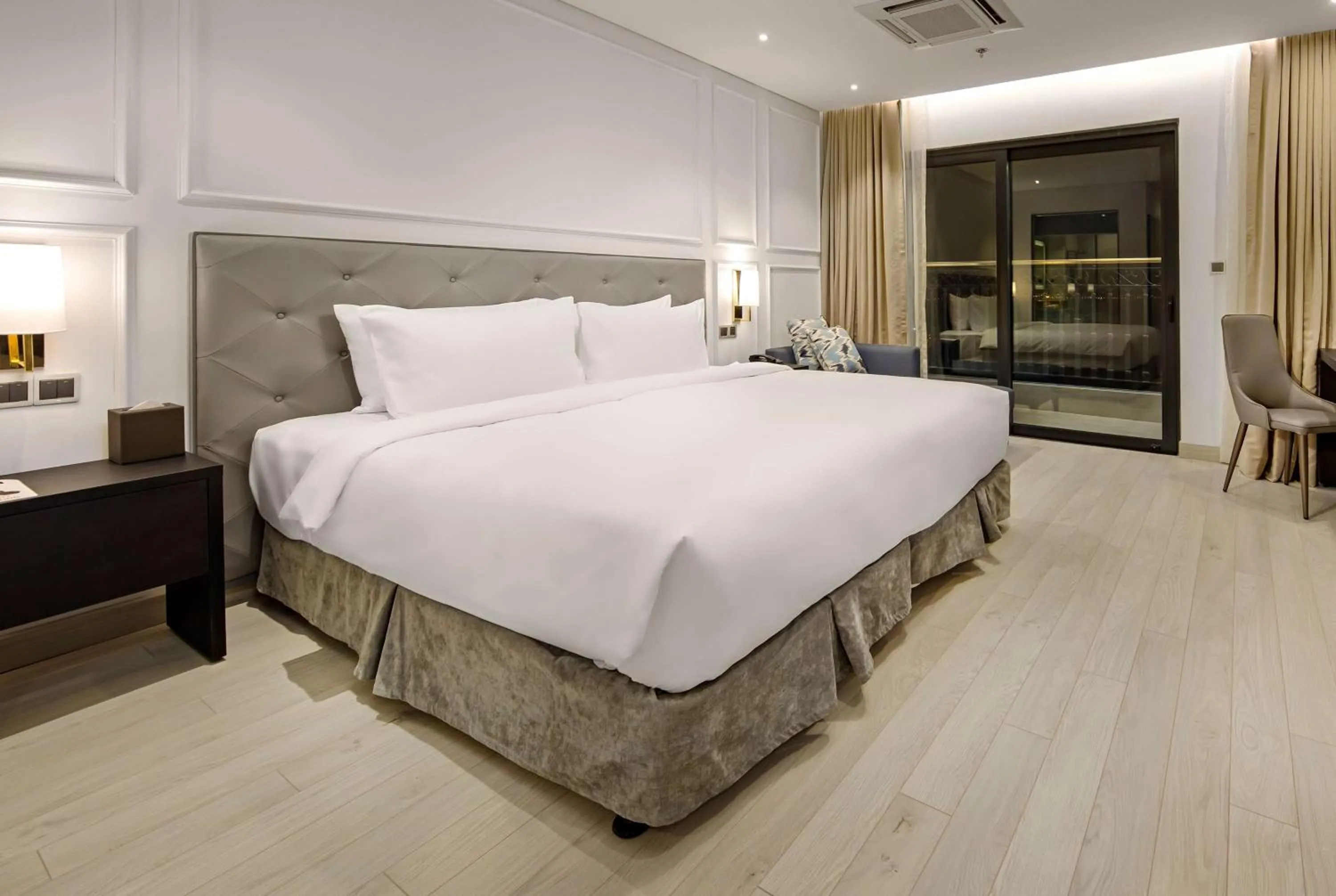 Photo of the whole room, Bed in Wyndham Danang Golden Bay - Free Shuttle Bus to Beach