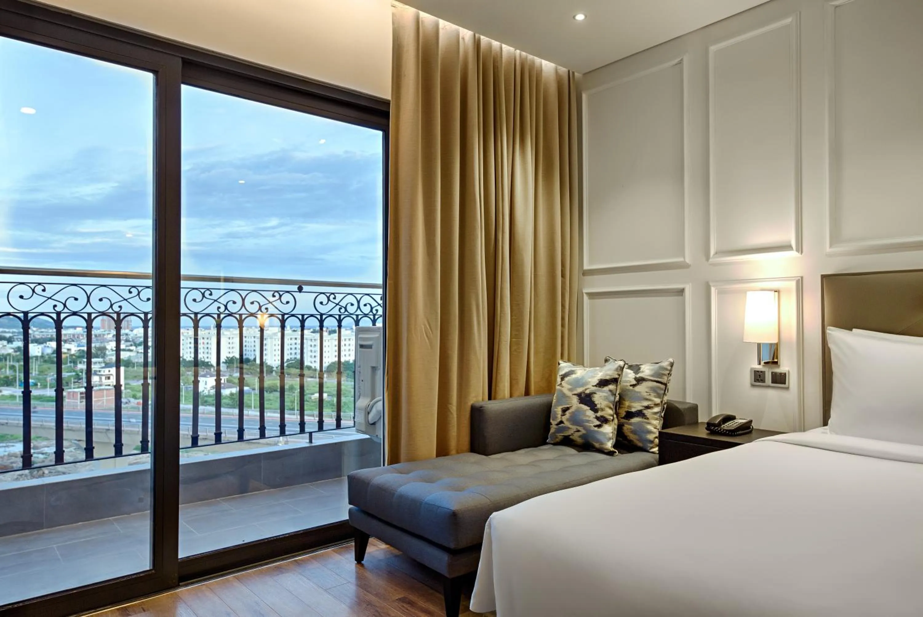 Balcony/Terrace, Bed in Wyndham Danang Golden Bay - Free Shuttle Bus to Beach