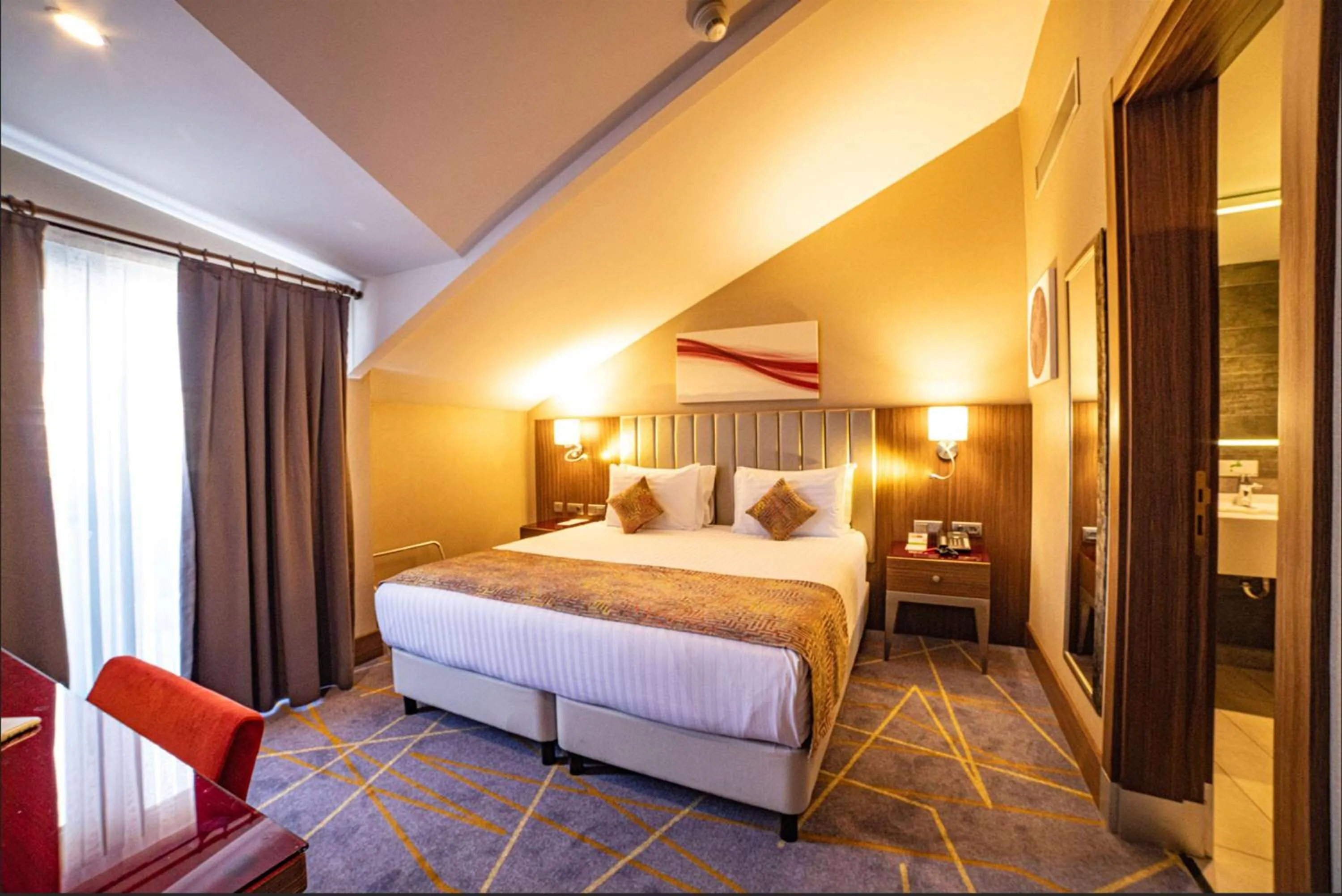 Photo of the whole room, Bed in Ramada by Wyndham Istanbul Alibeykoy