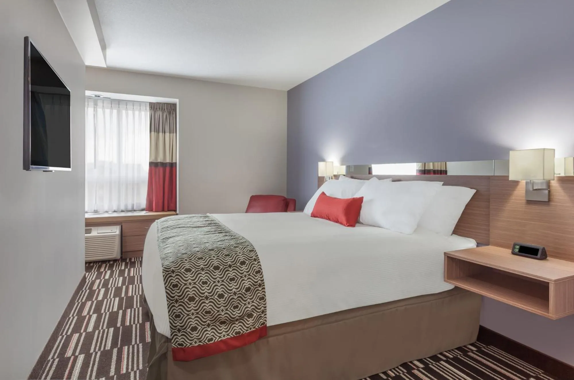 Bedroom, Bed in Microtel Inn & Suites by Wyndham Fort McMurray