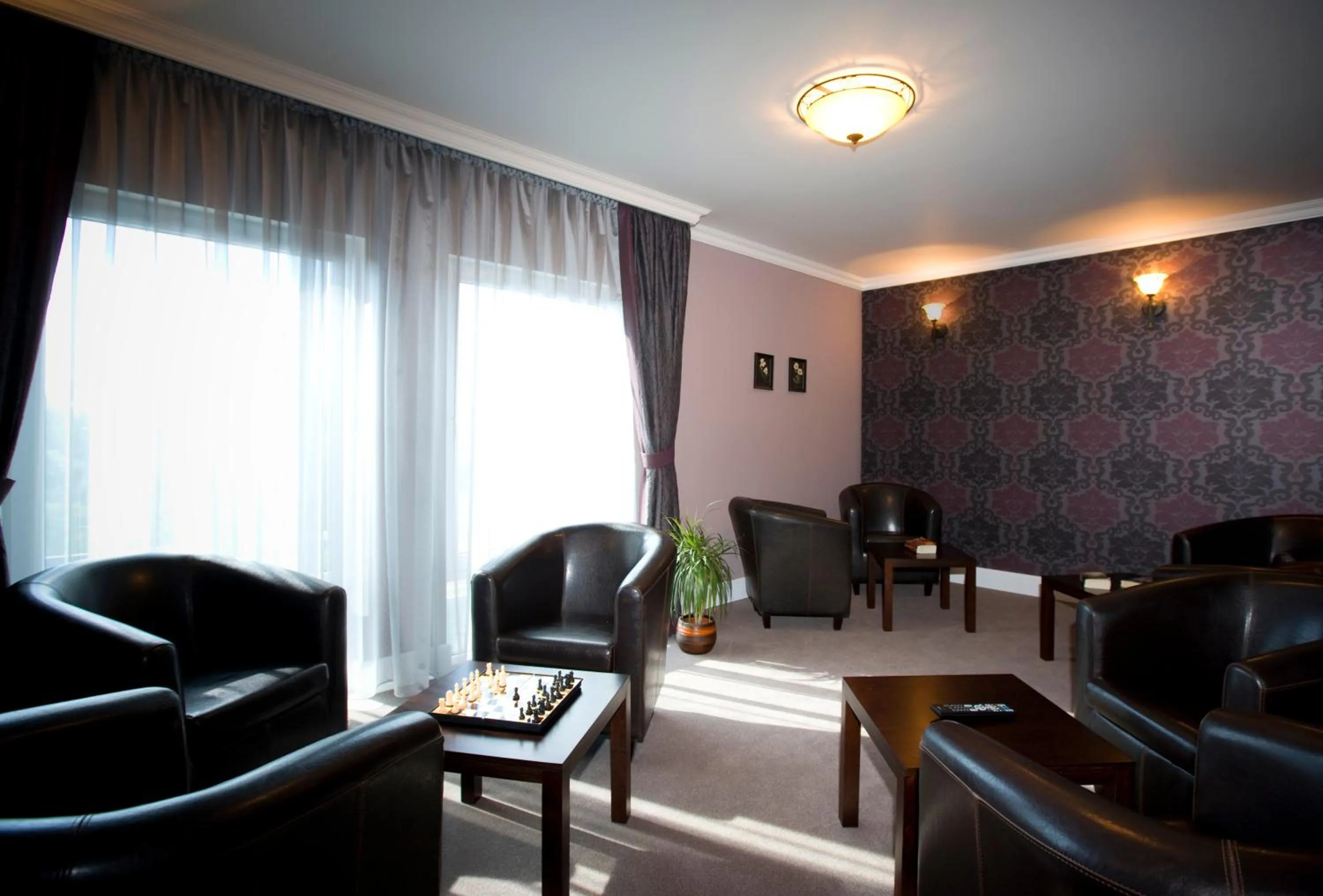 Communal lounge/ TV room in Pension Eden