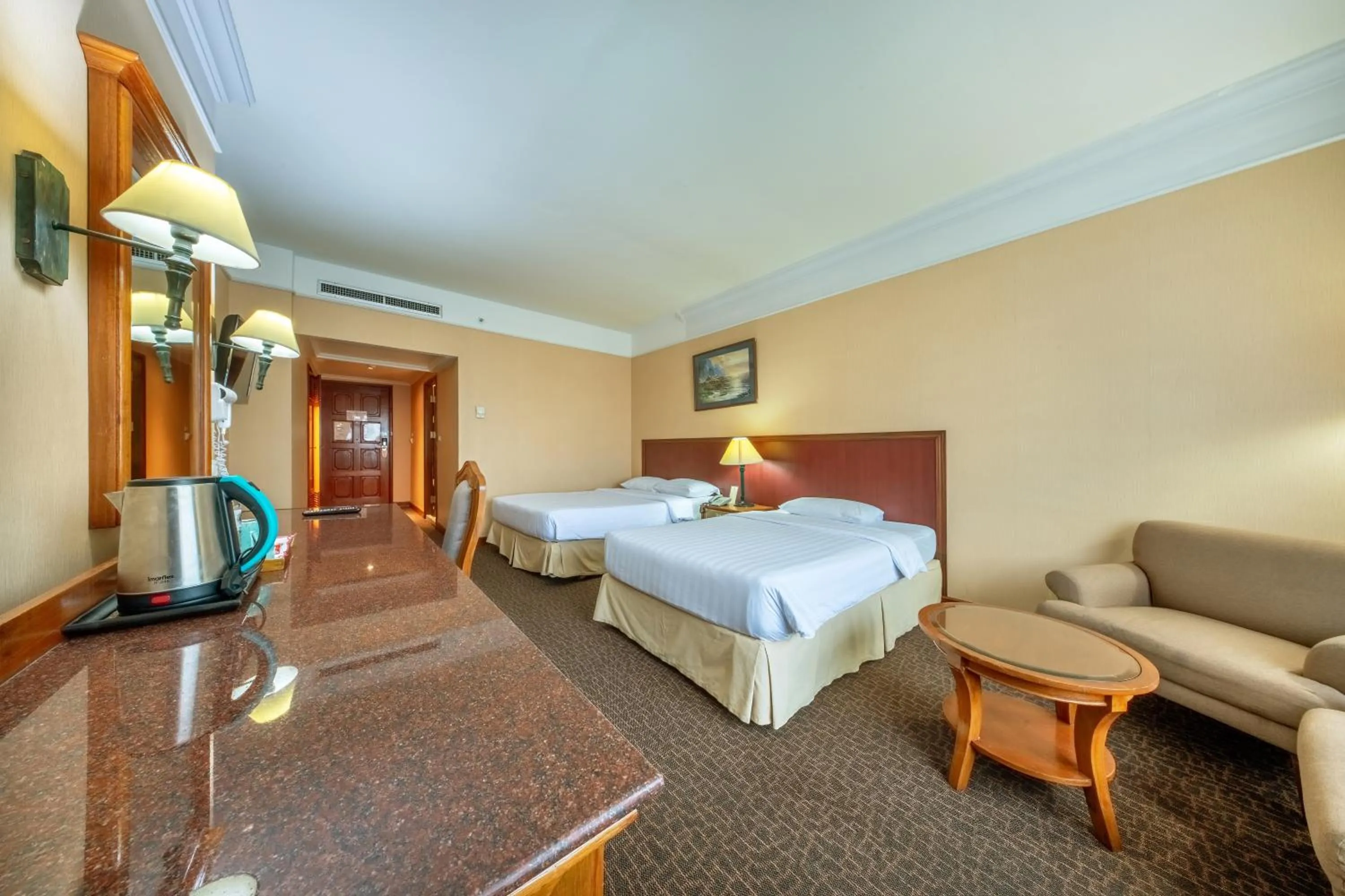Bed in Royal Benja Hotel - Big Room Family-Friendly