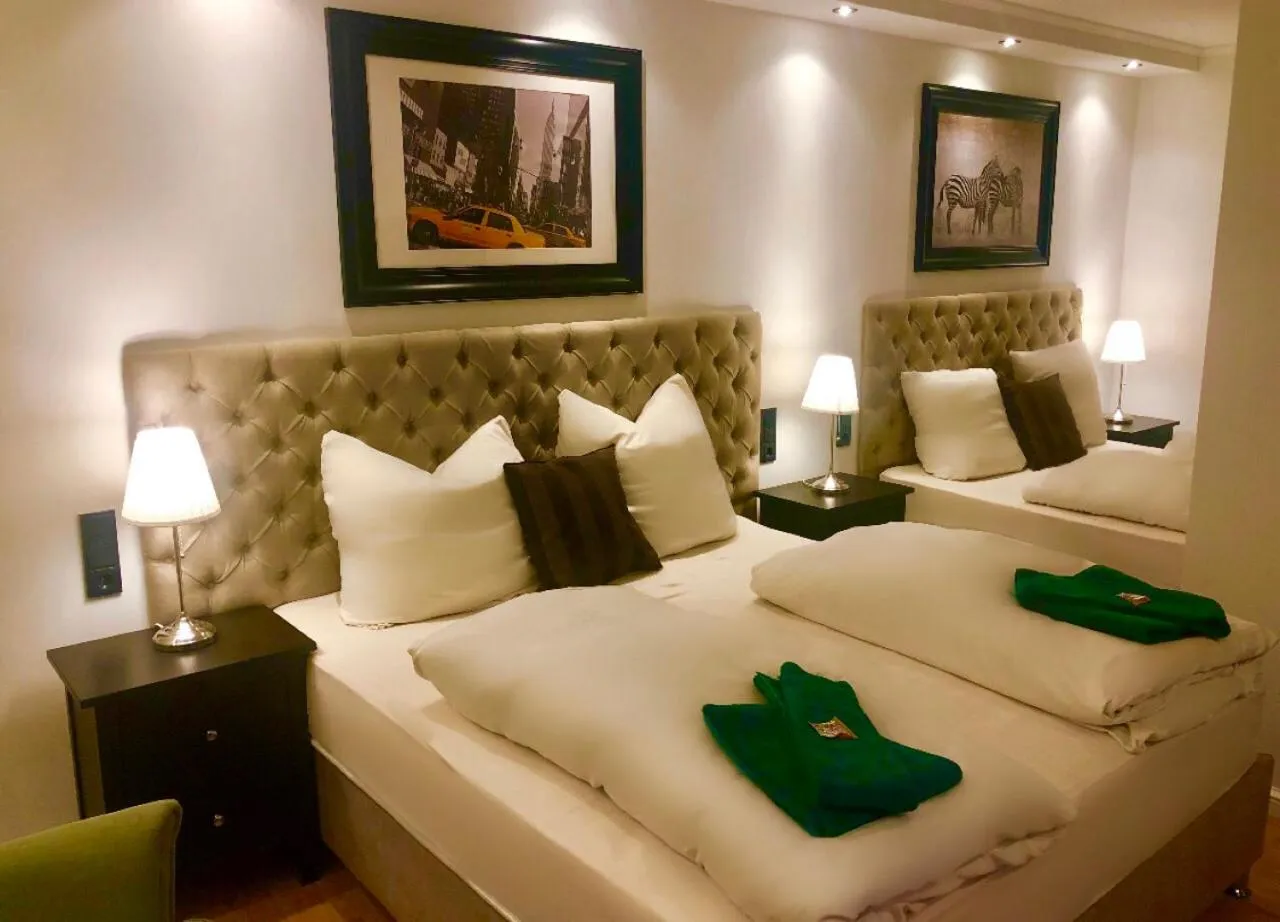 Photo of the whole room, Bed in Hotel Ramor Garni