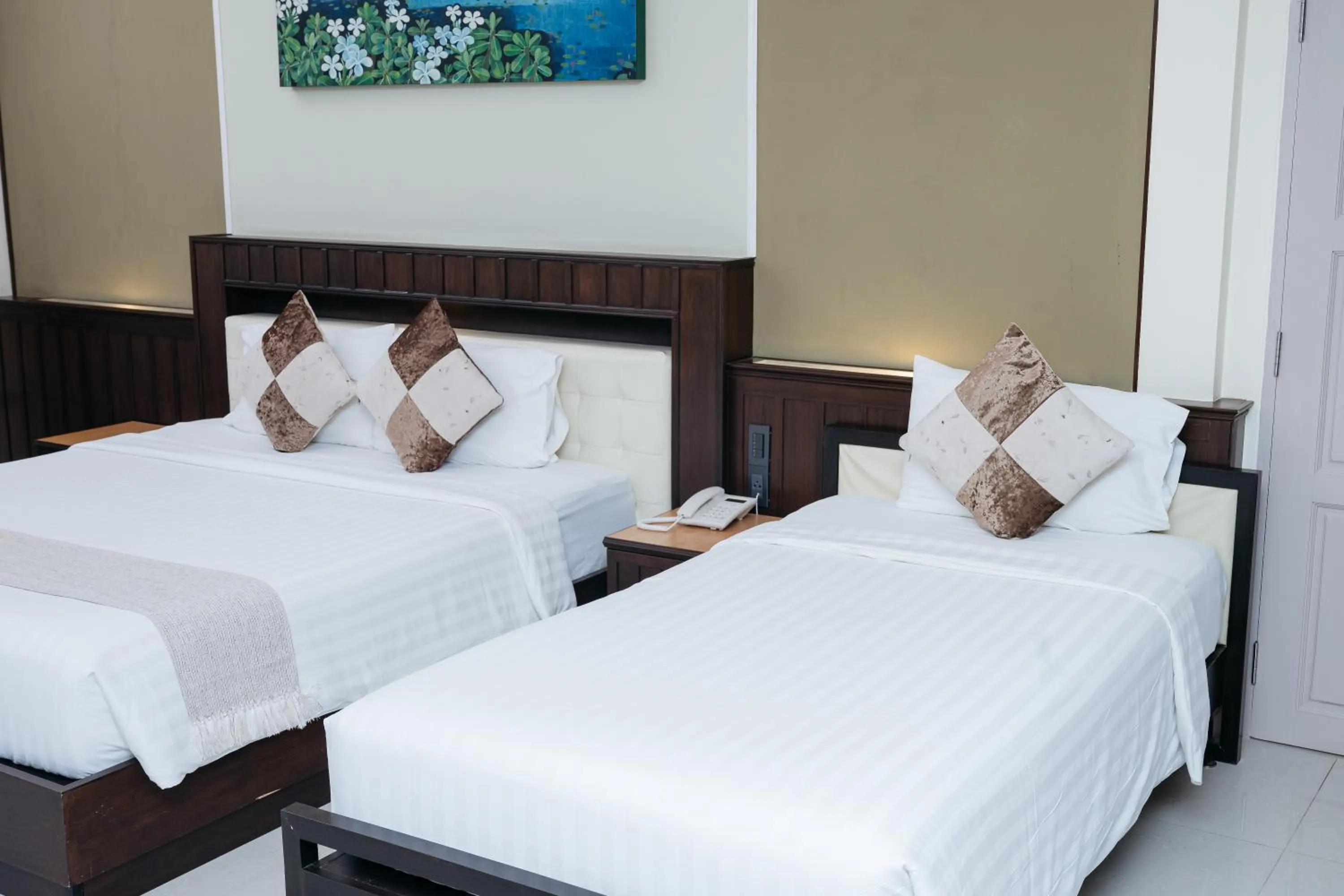 Bed in Villa Wanida Garden Resort