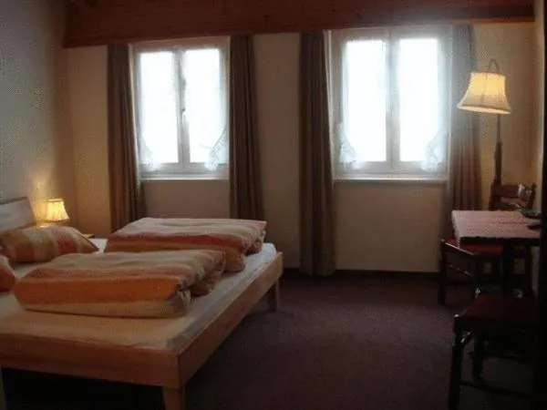 Photo of the whole room, Bed in Gasthaus Skiklub