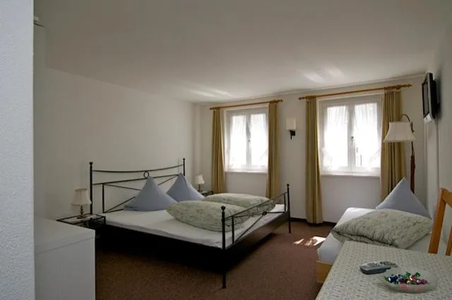 Photo of the whole room, Bed in Gasthaus Skiklub