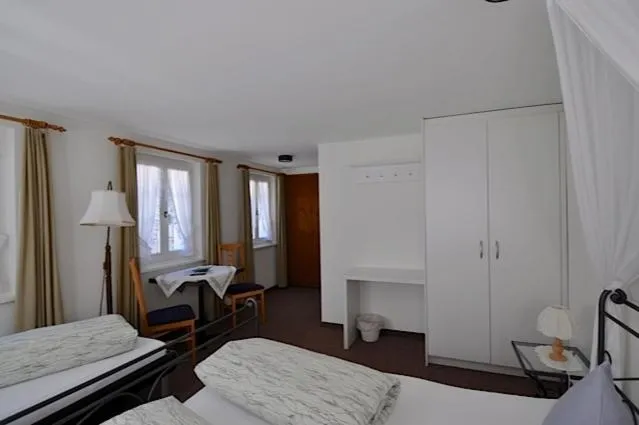 Photo of the whole room, Bed in Gasthaus Skiklub