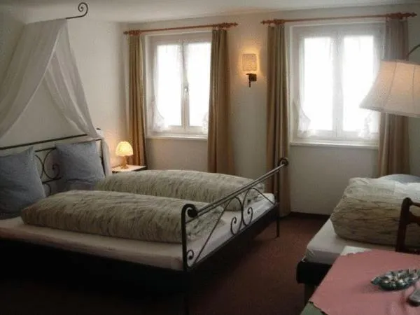 Photo of the whole room, Bed in Gasthaus Skiklub