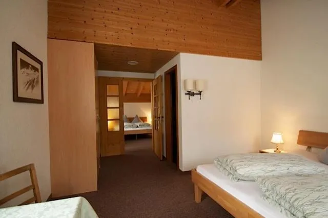 Photo of the whole room, Bed in Gasthaus Skiklub