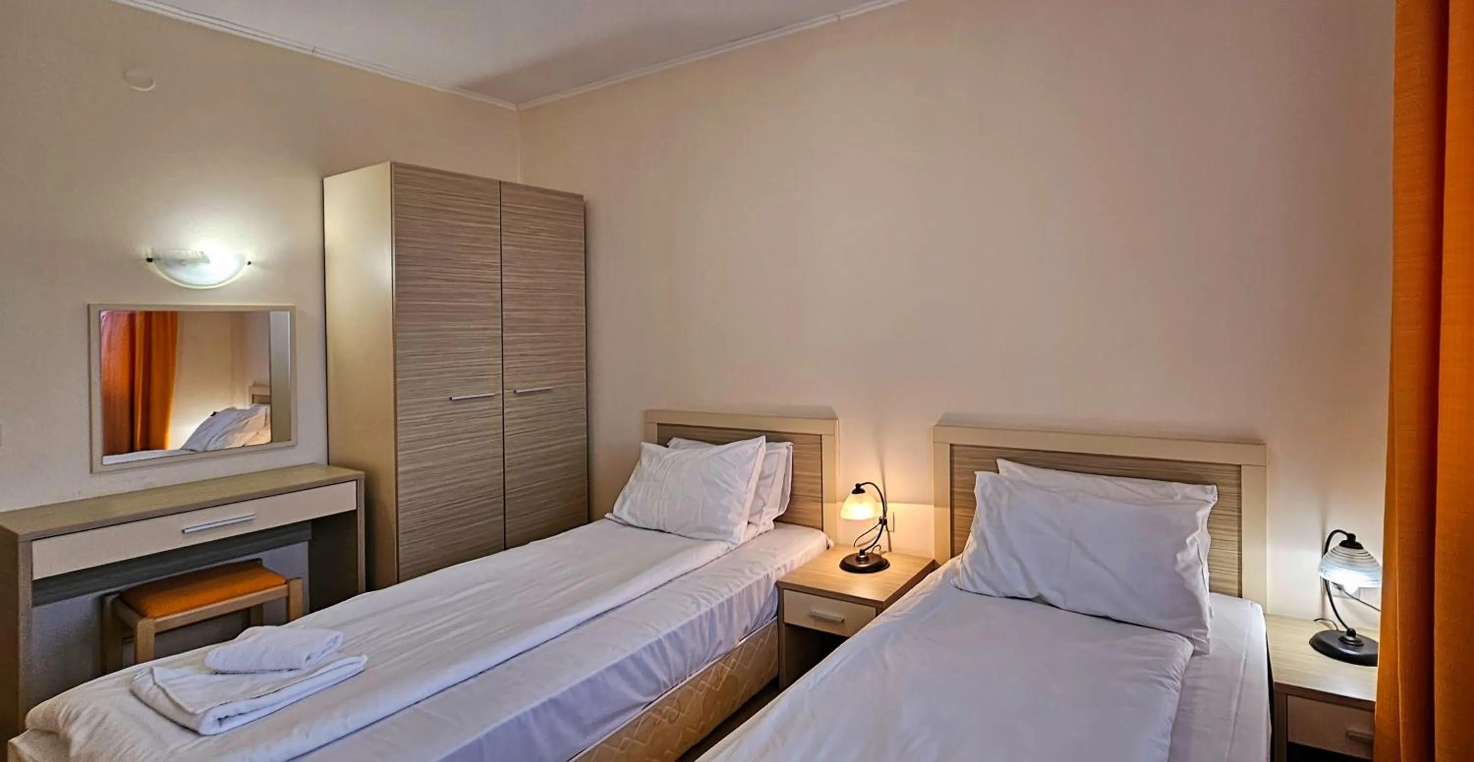 Bed in Royal Sun Apartments