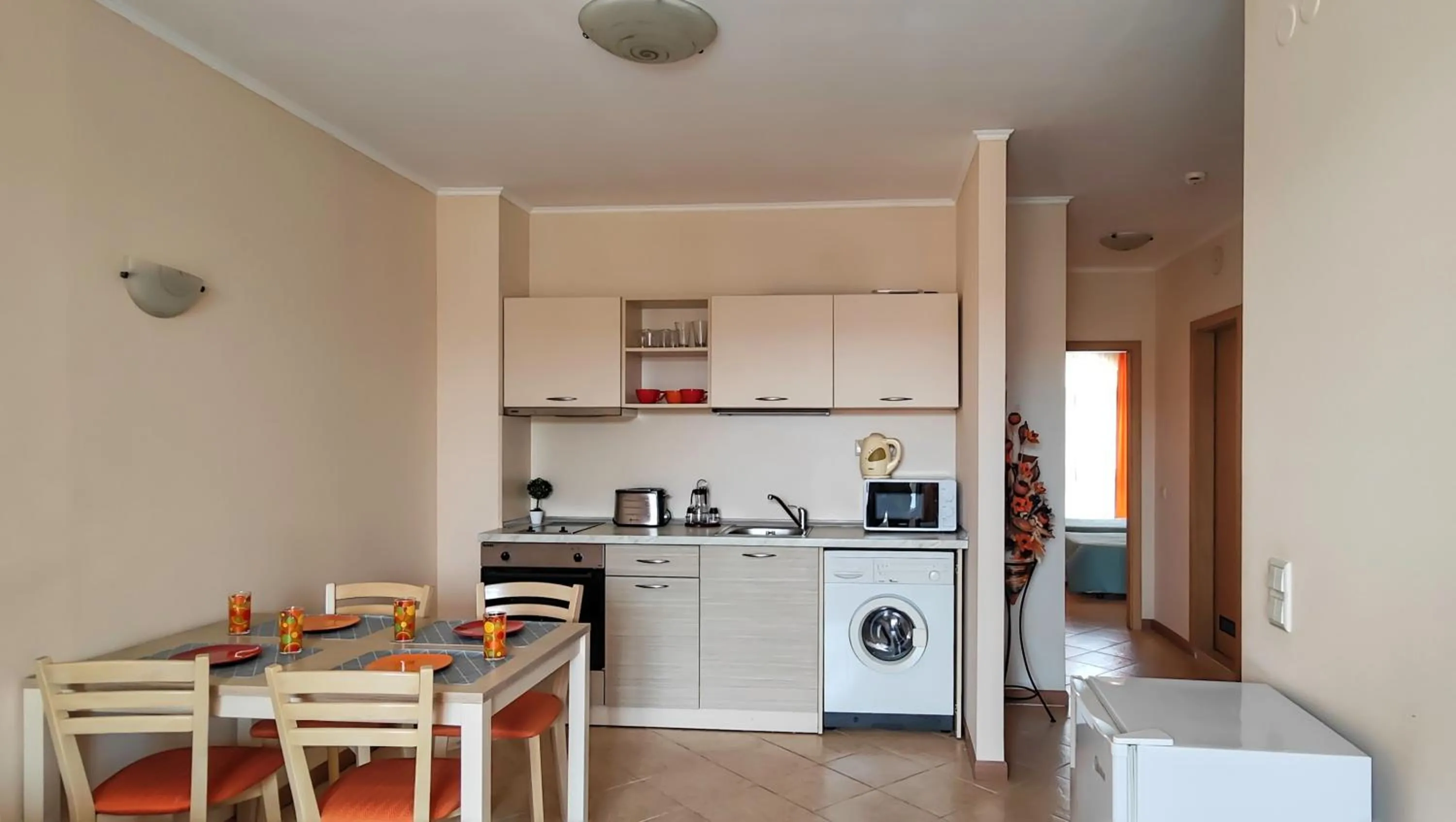Kitchen or kitchenette in Royal Sun Apartments
