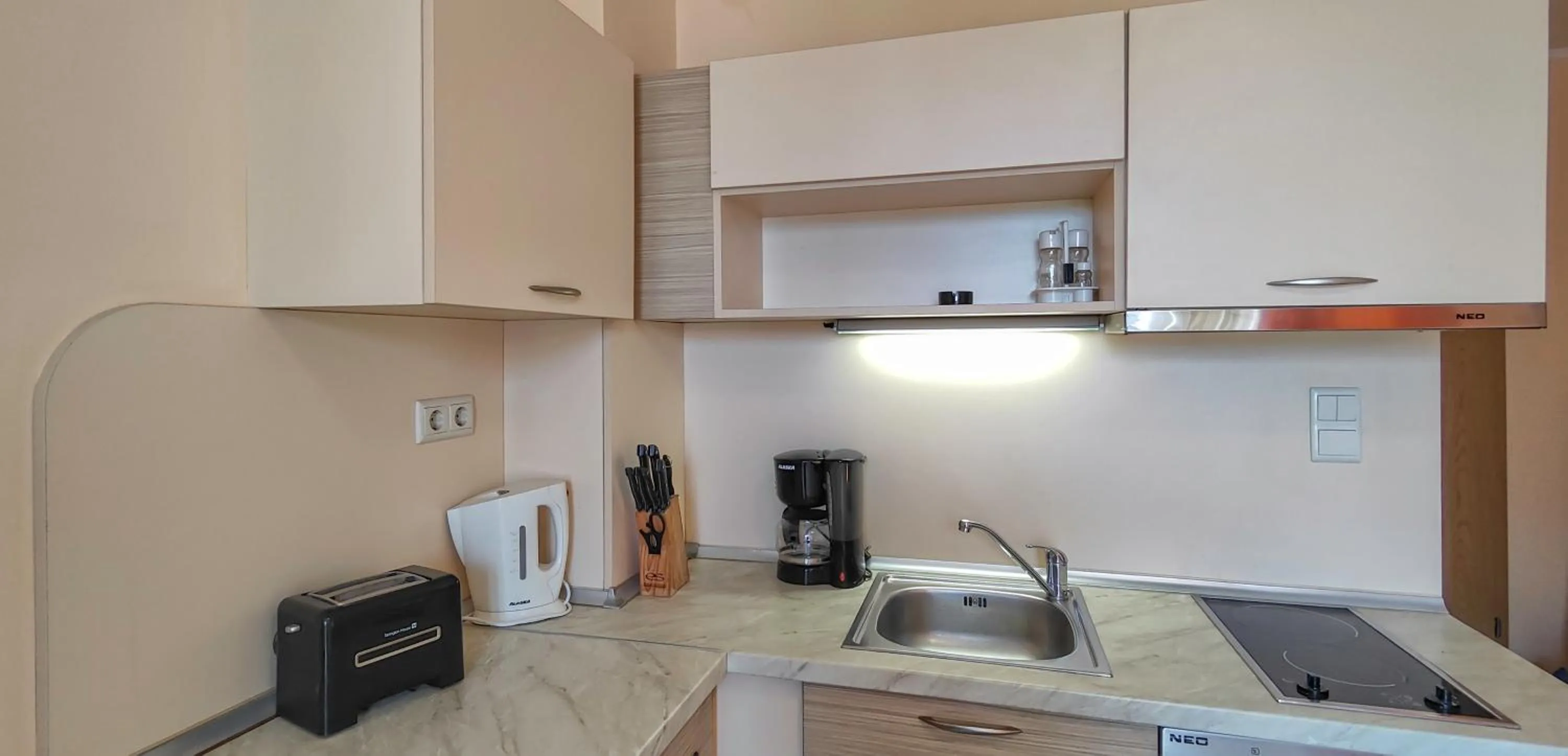 Kitchen or kitchenette in Royal Sun Apartments