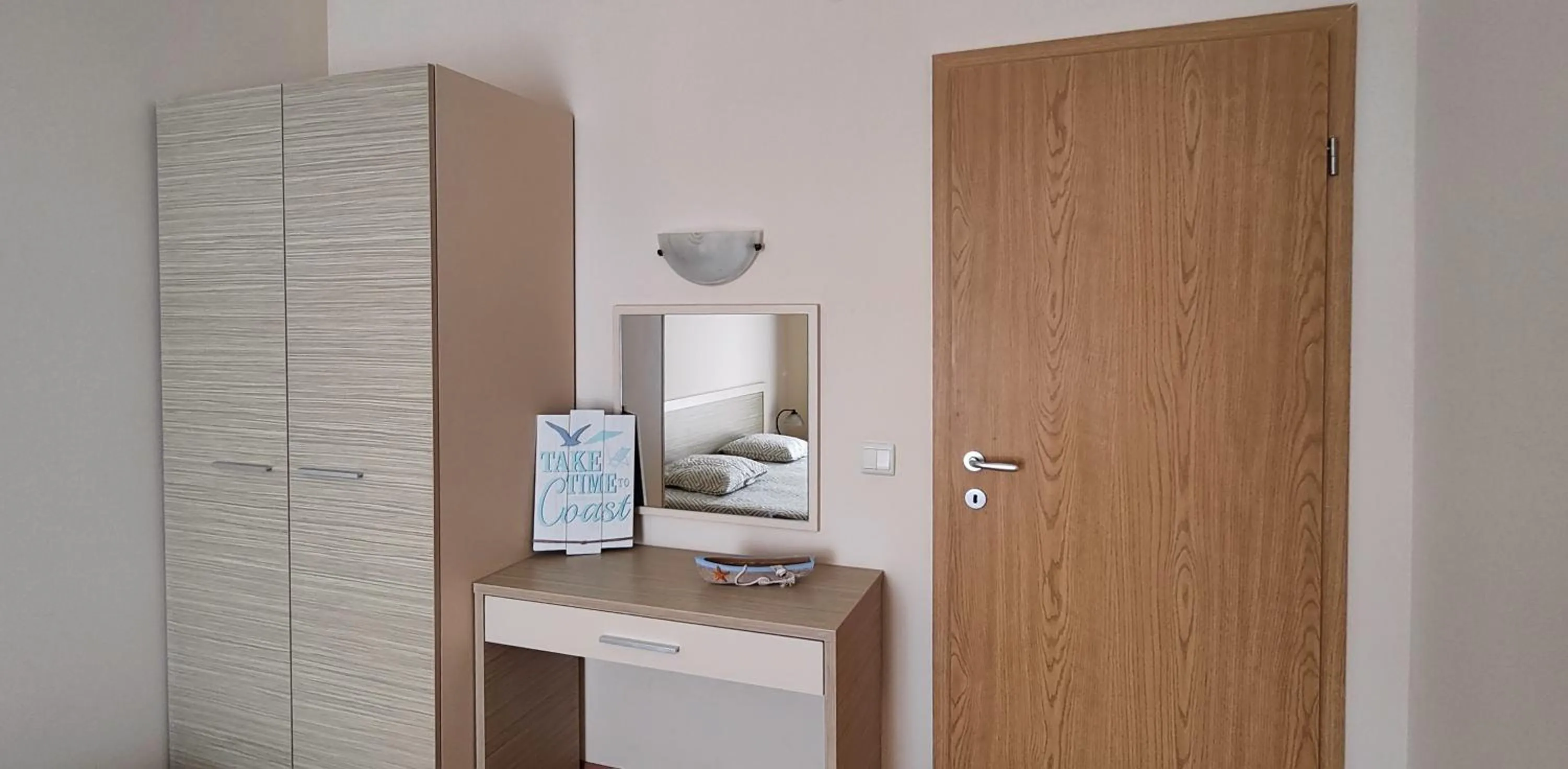 Bedroom in Royal Sun Apartments