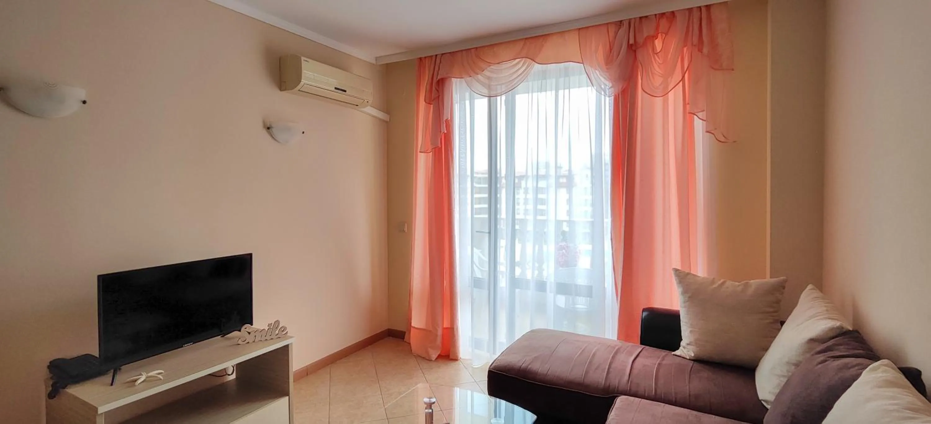 Bed in Royal Sun Apartments