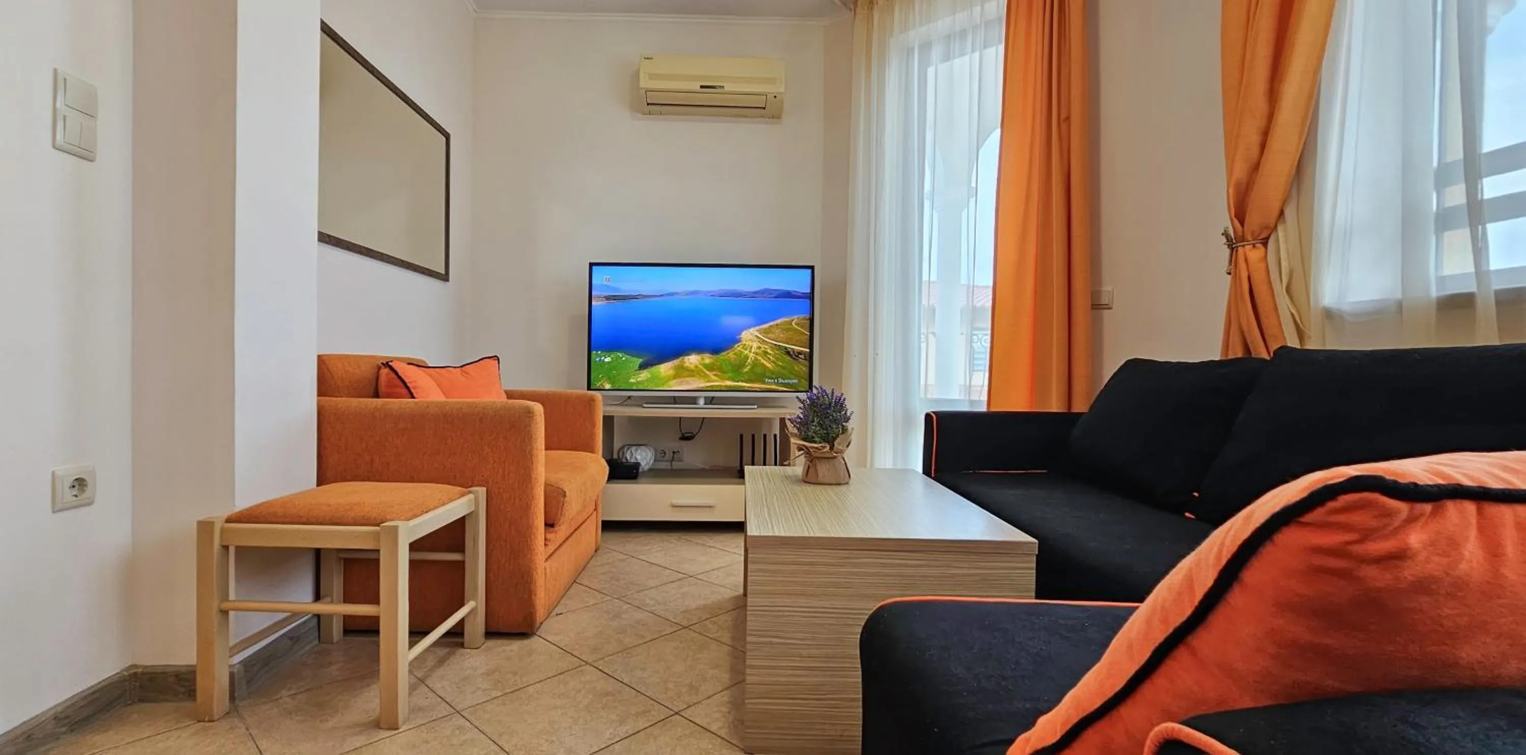 Bed in Royal Sun Apartments