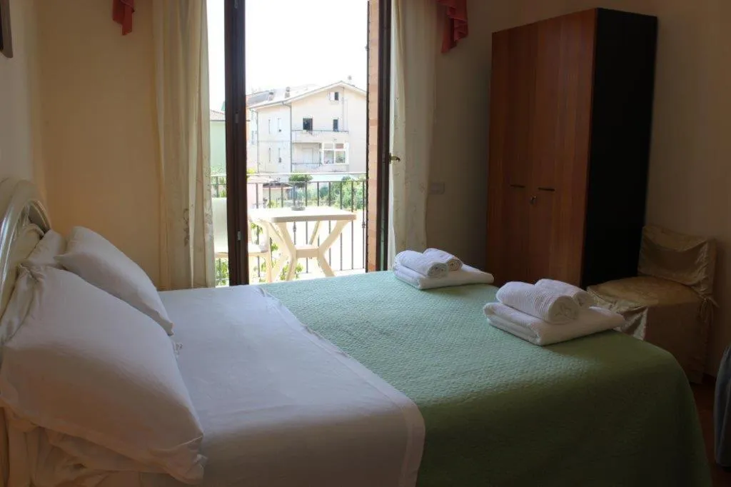 Bed in AFFITTACAMERE La Tartaruga