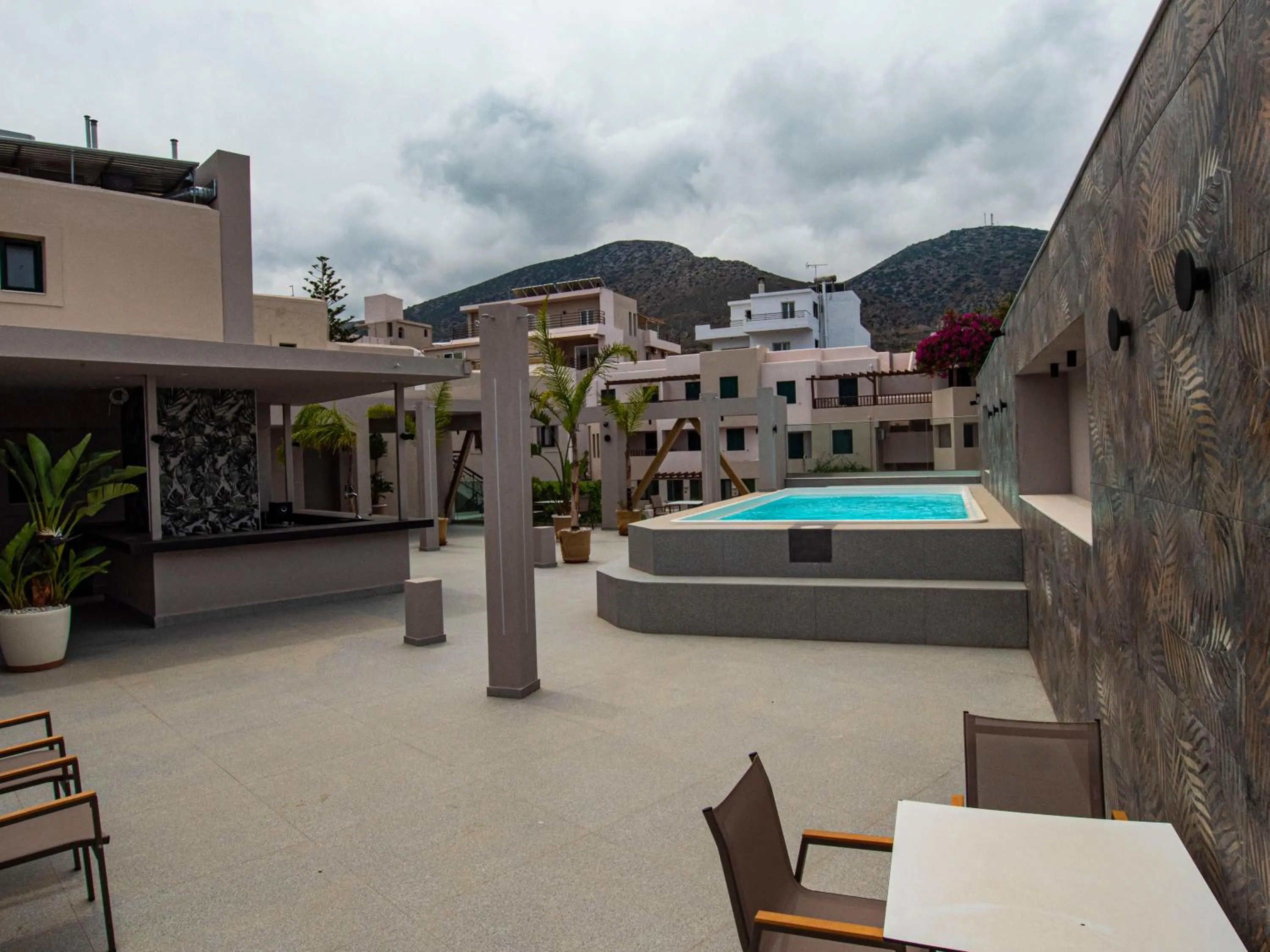 Swimming pool in Porto Greco Village Beach Hotel