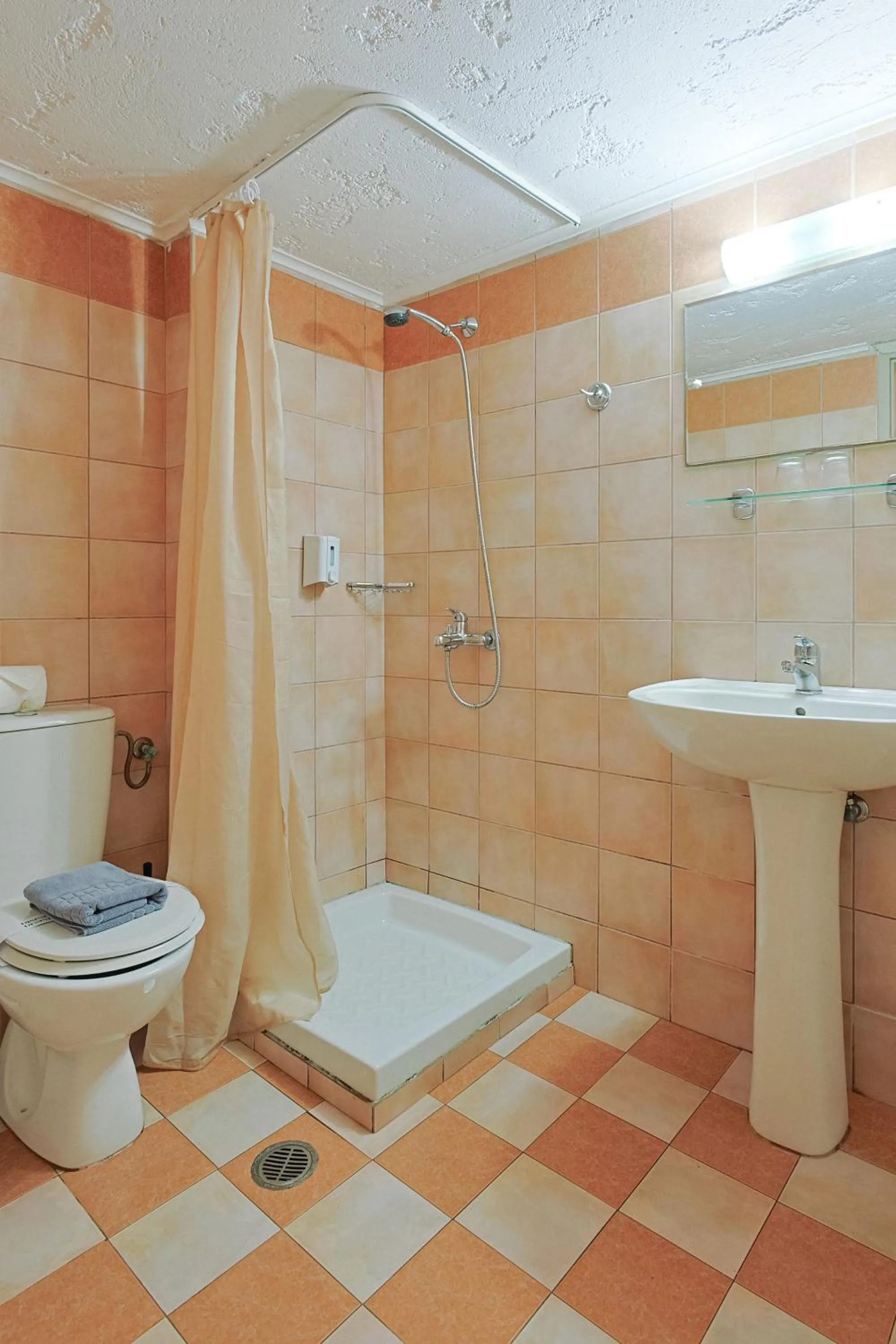 Bathroom in Porto Greco Village Beach Hotel