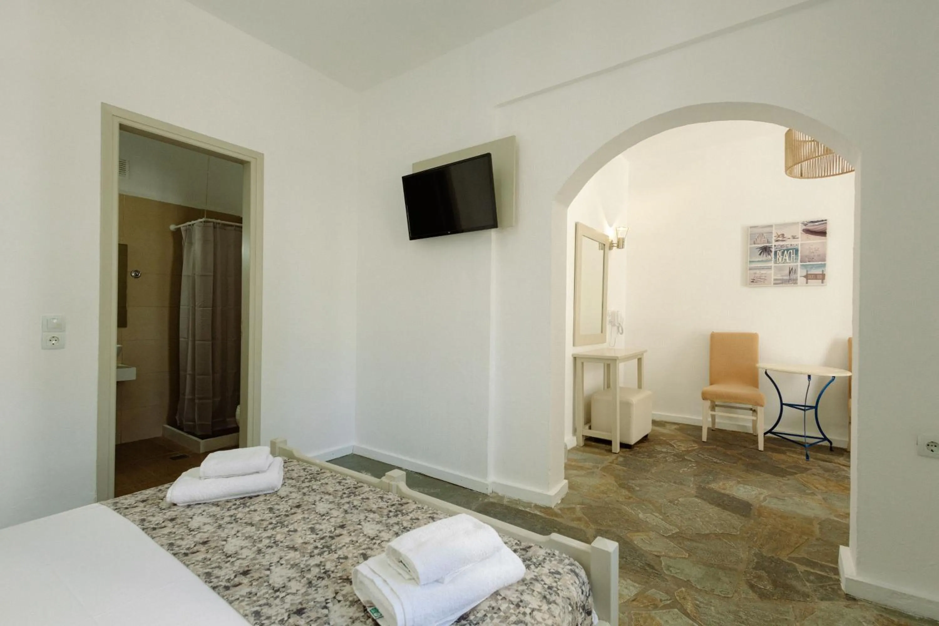 Bed in Porto Greco Village Beach Hotel