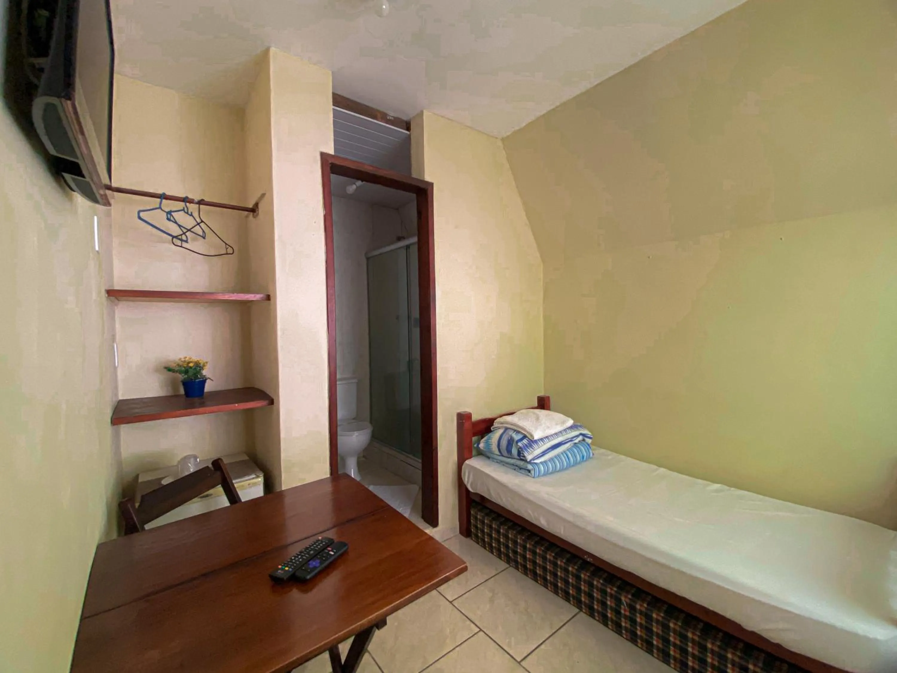 Bed in Pousada Chale da Montanha