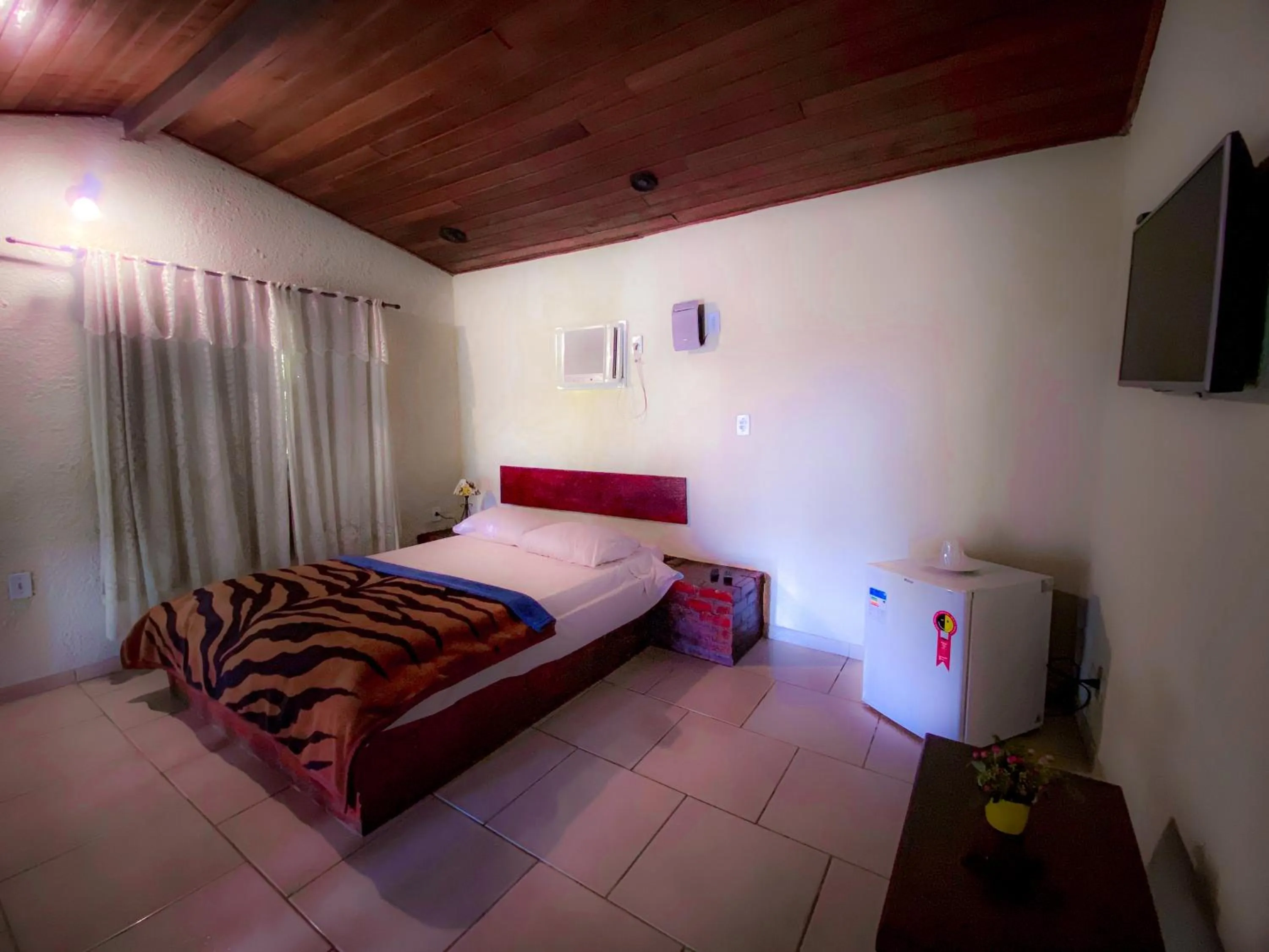 Bed in Pousada Chale da Montanha