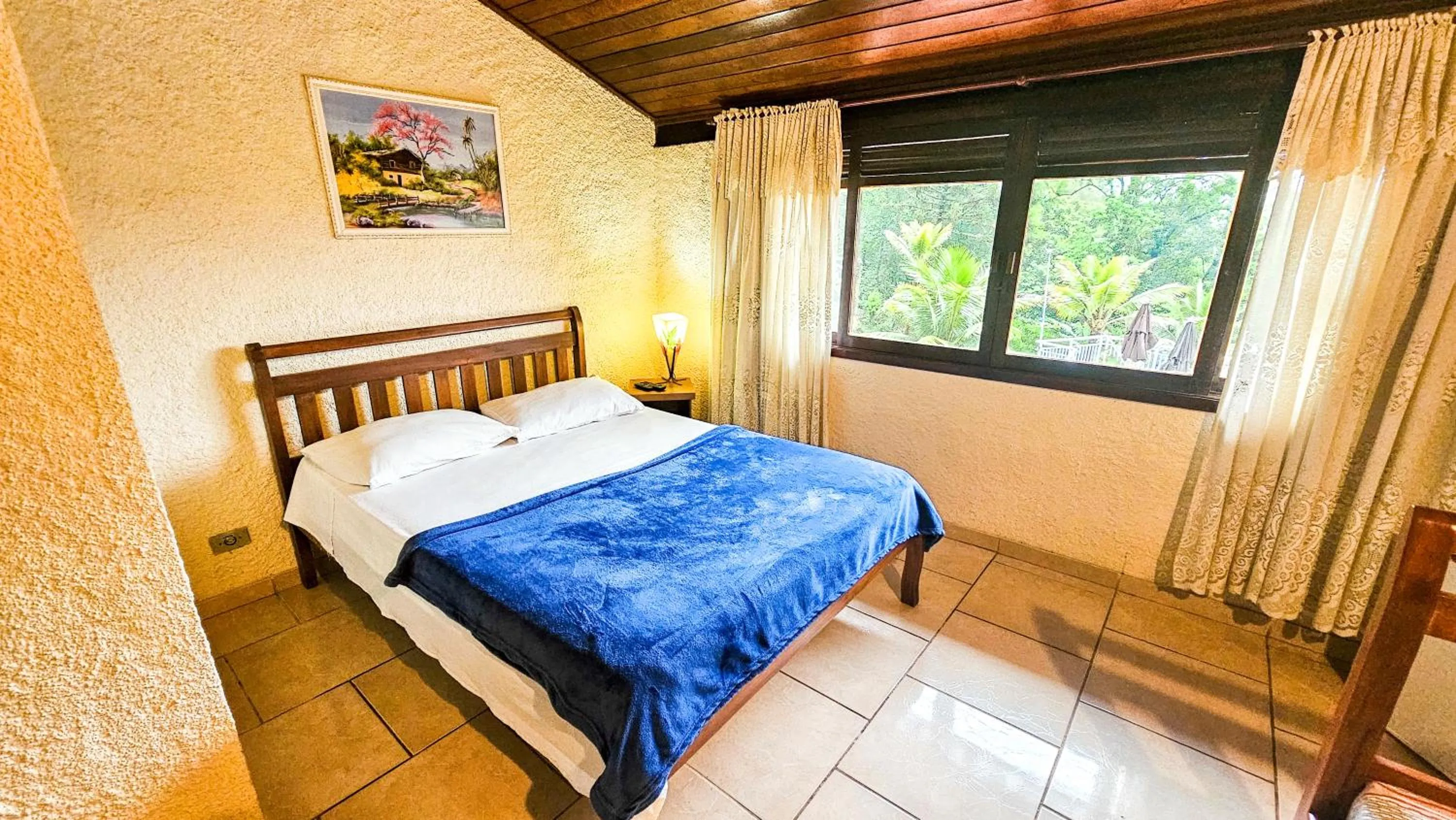 Bed in Pousada Chale da Montanha