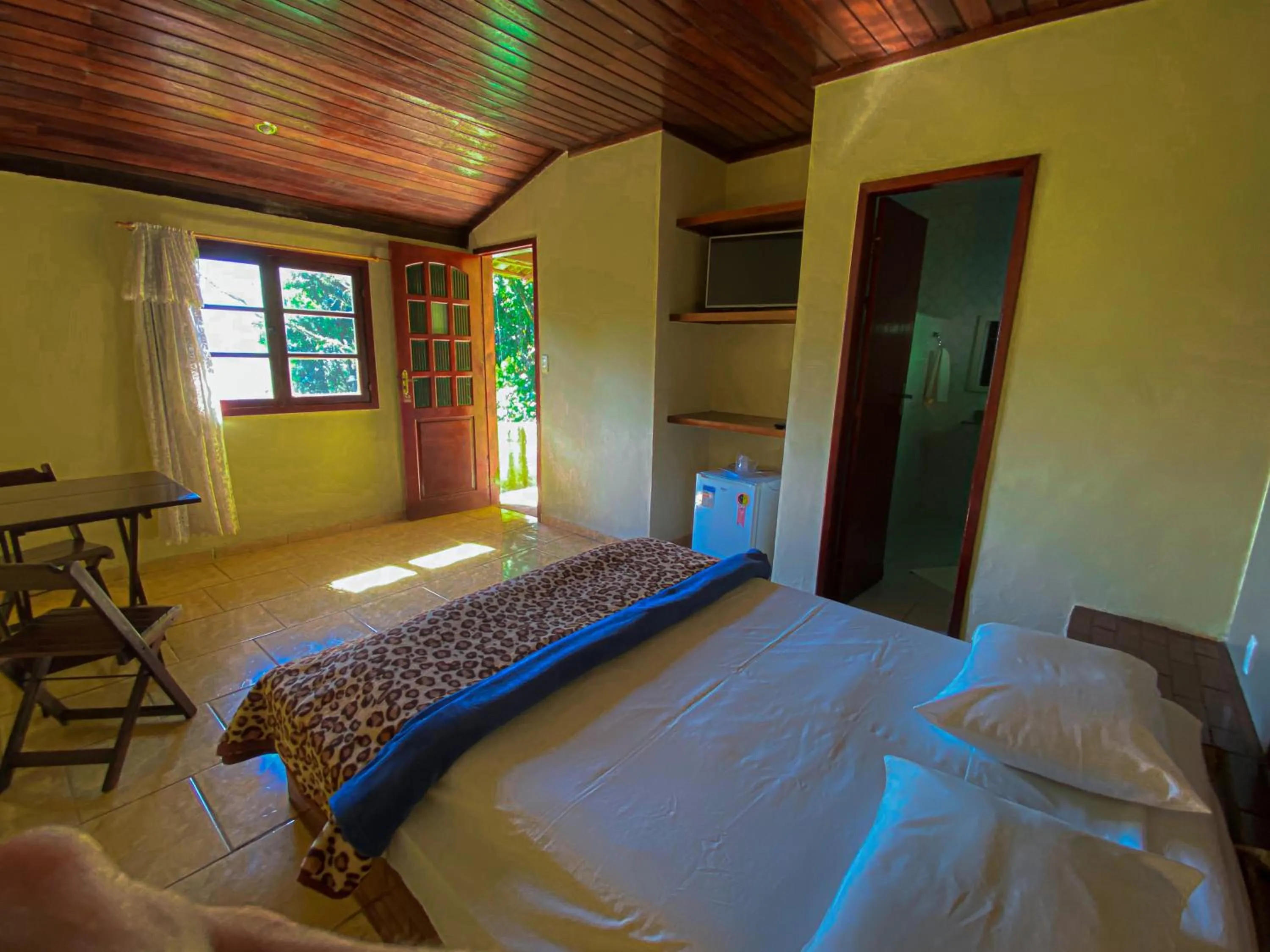 Bed in Pousada Chale da Montanha