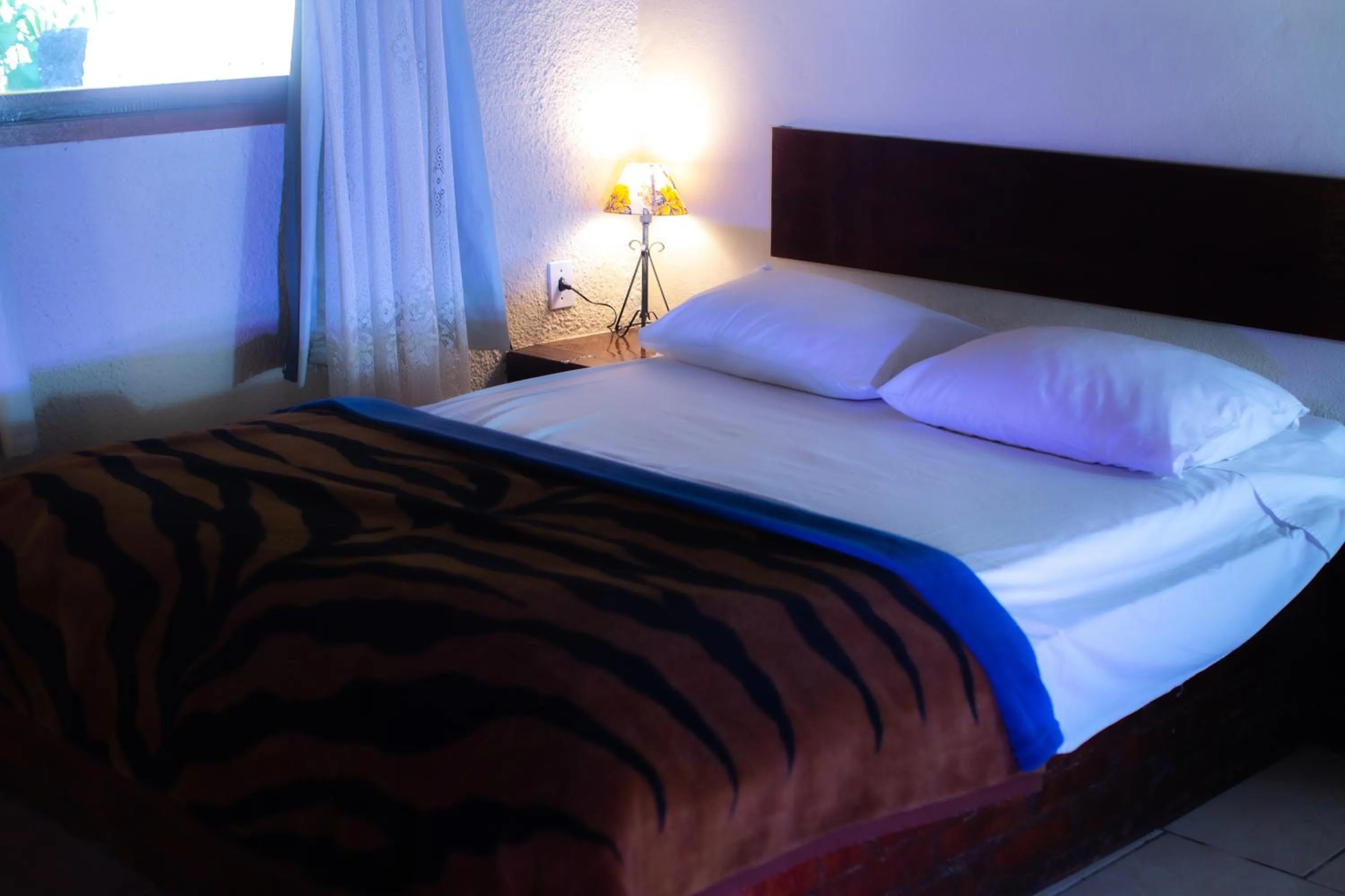 Bed in Pousada Chale da Montanha