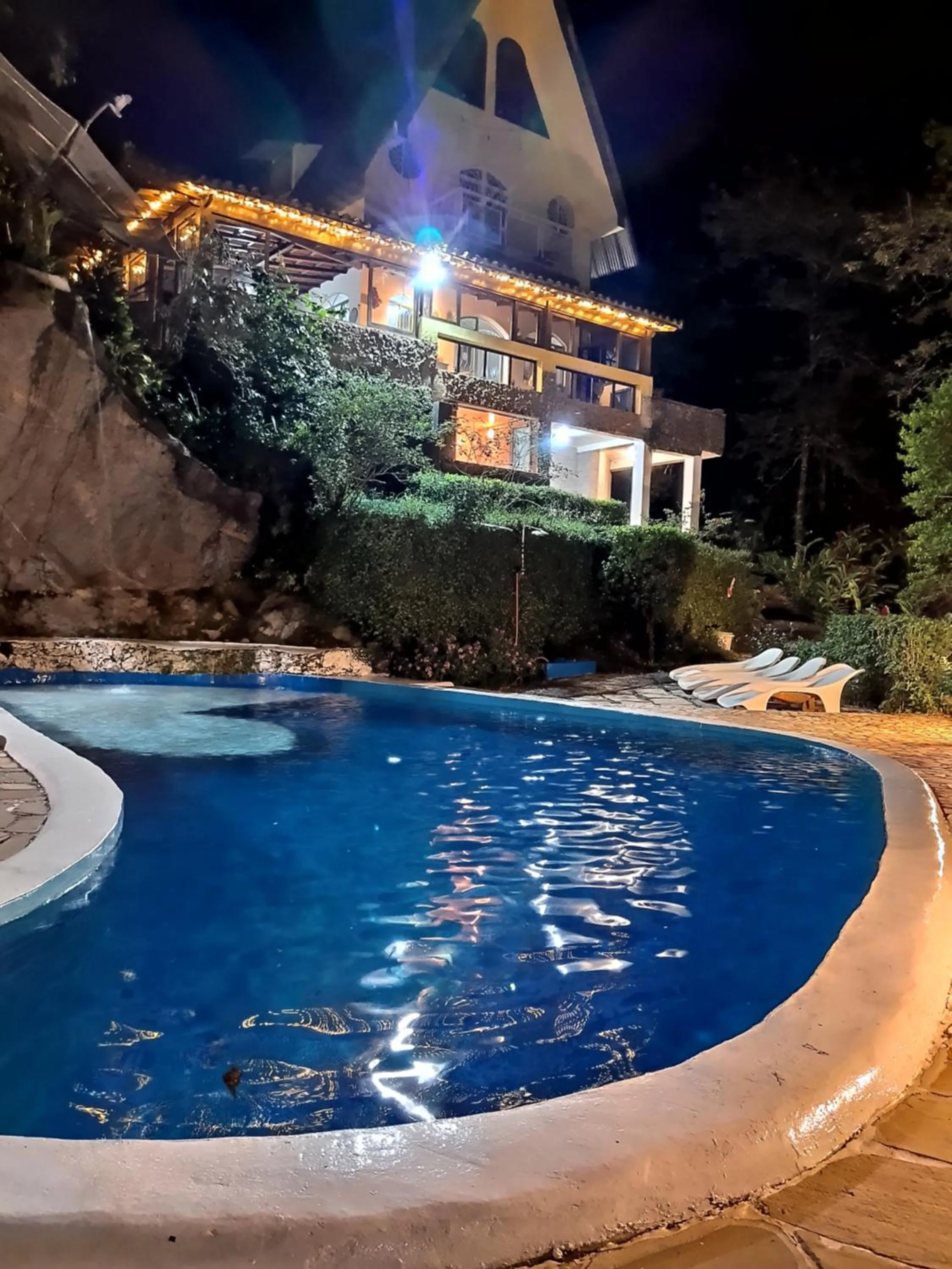 Swimming pool in Pousada Chale da Montanha