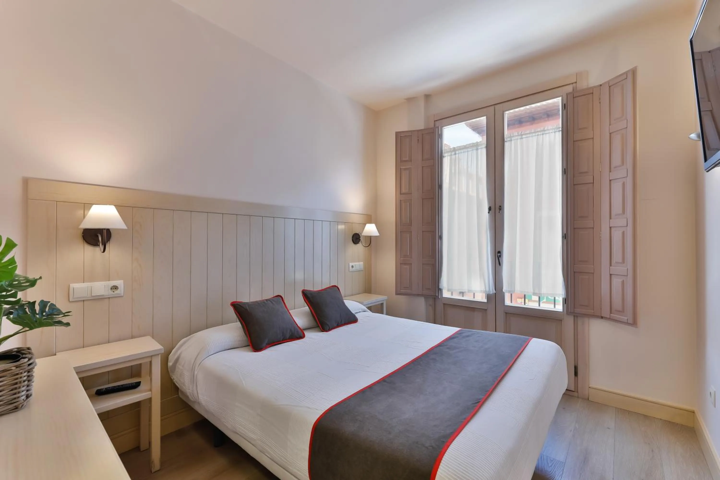 Bedroom, Bed in Hostal La Chata by Vivere Stays