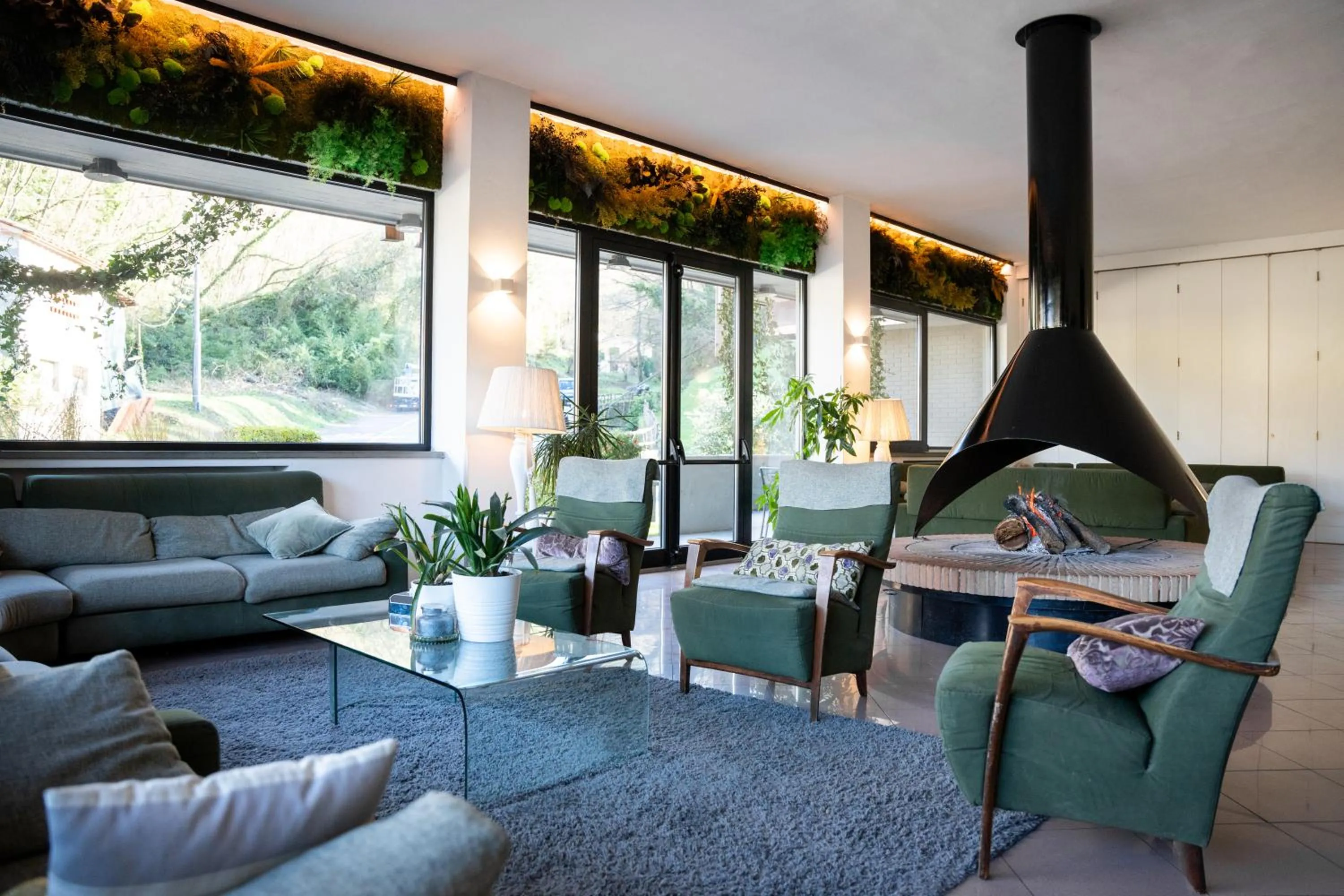 Communal lounge/ TV room in EcoHotel Ristorante Milano